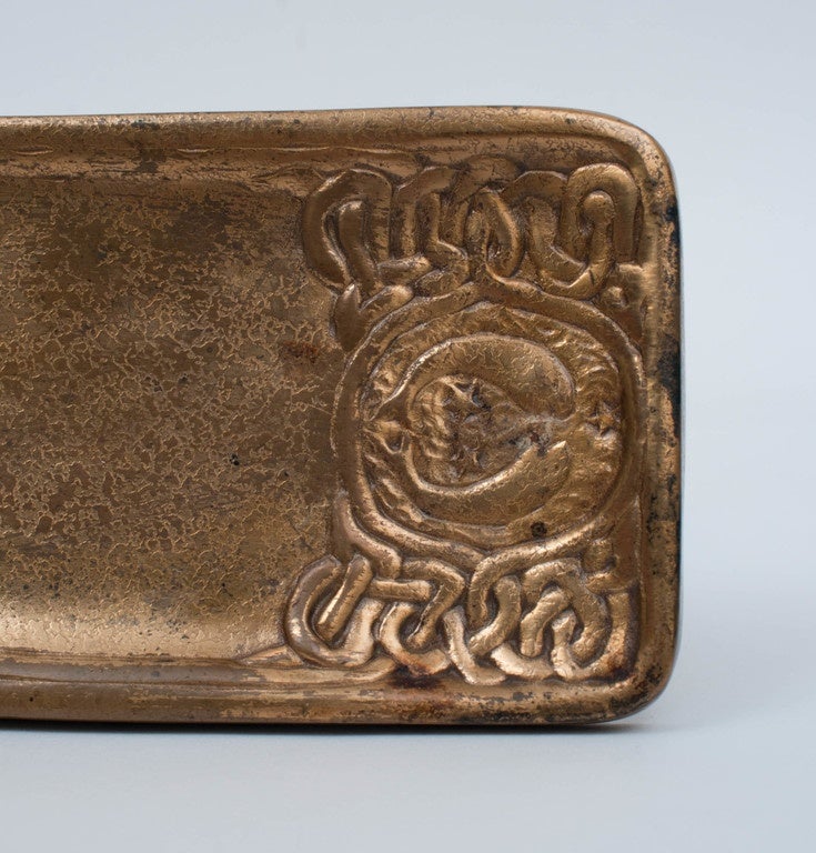 Bronze with its original gold doré patina, slight surface wear due to age, marked “Tiffany Studios New York 1000.”  Marketed at the time as having  Zodiac 