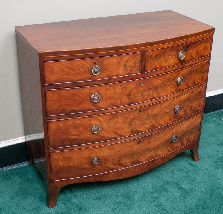 Two over three drawer Hepplewhite chest - mahogany and figured mahogany with a satinwood bead on edge of the top - oak secondary wood - Regency ring pulls.