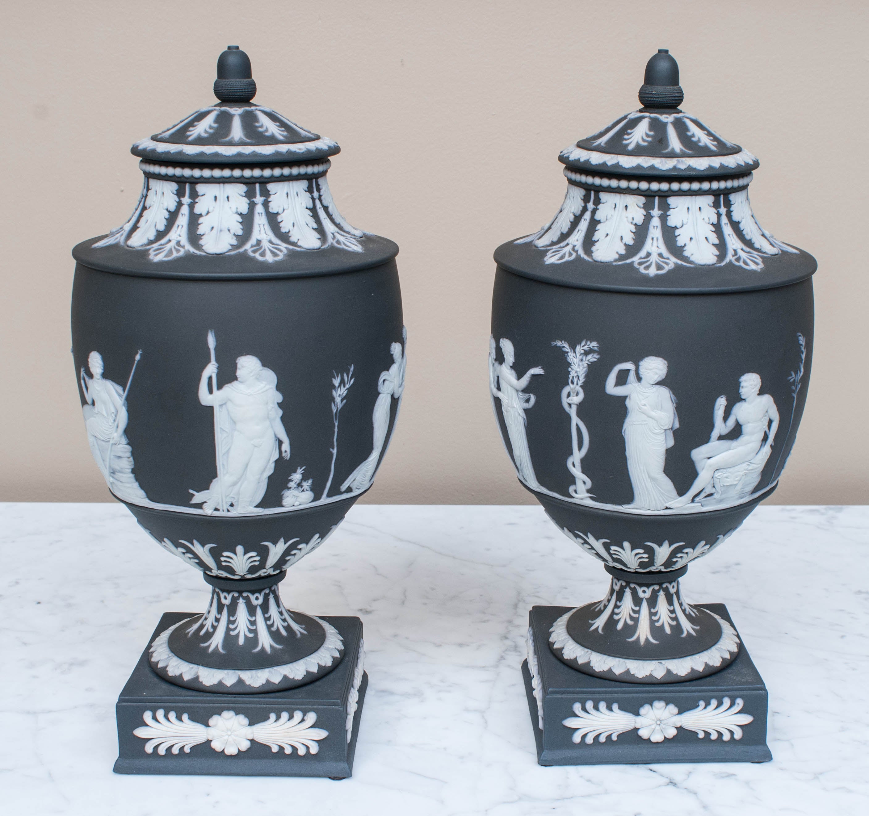 Pair of Black Wedgwood Jasperware Lidded Urns