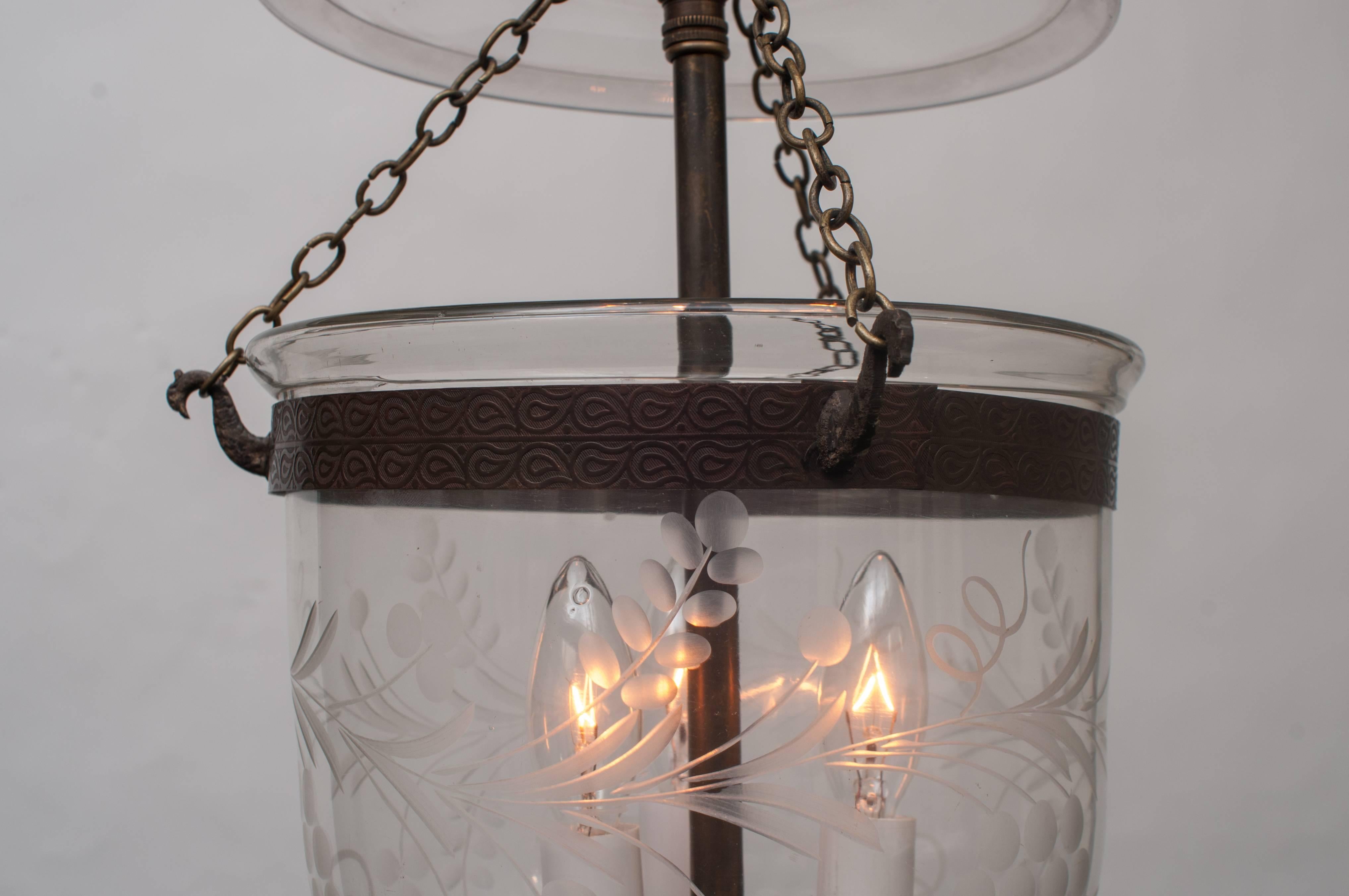 Handblown with glass pontil, original brass ring, three lights and height can be adjusted. Ceiling cap, chain, and hanging hardware included. Free installation within the Washington metro area, subject to some caveats.