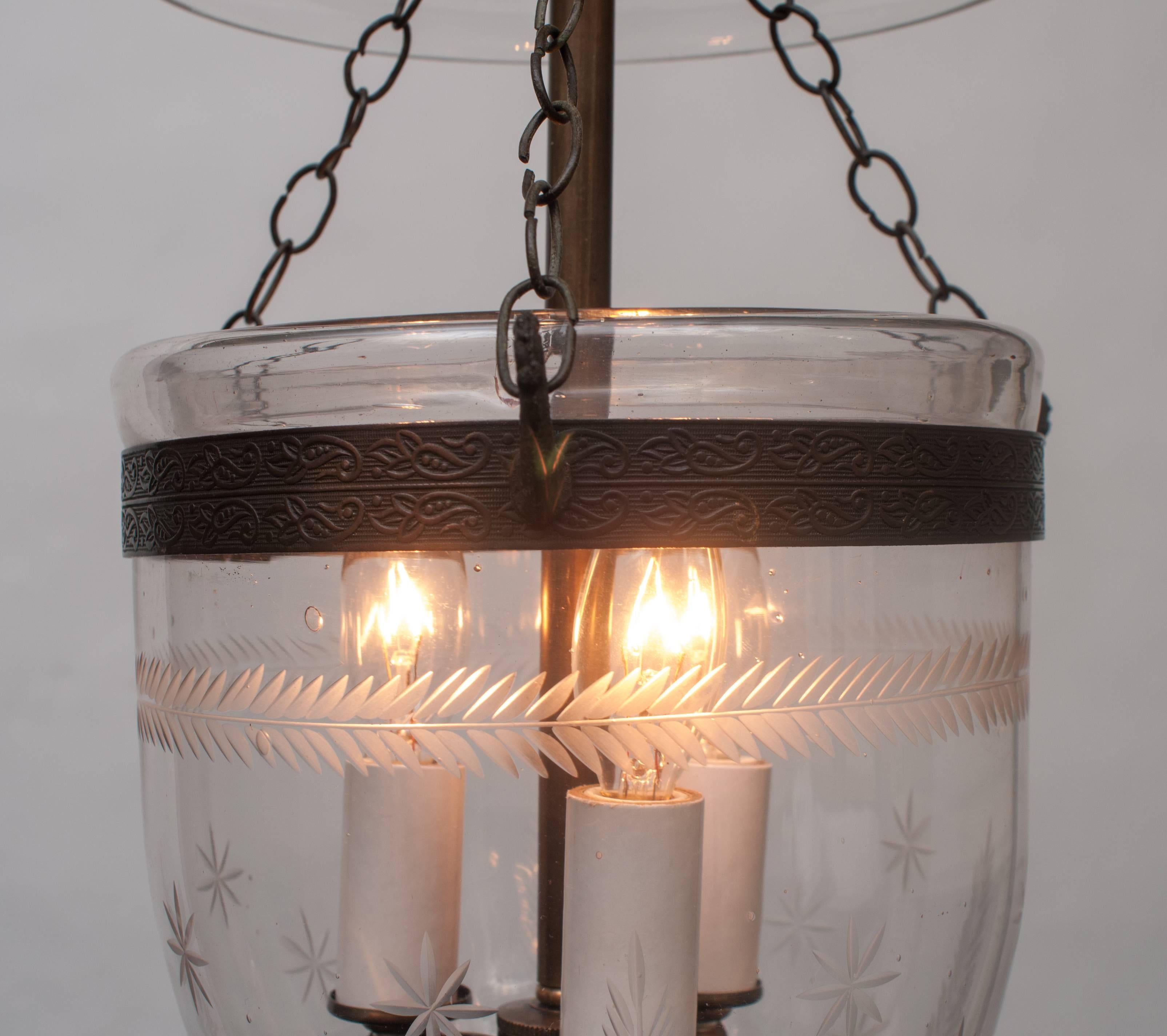 Hand etched - three lights - original brass - blown glass pontil (finial) - height can be adjusted. Ceiling cap, chain, and hanging hardware included. Free installation within the Washington metro area, subject to some caveats.