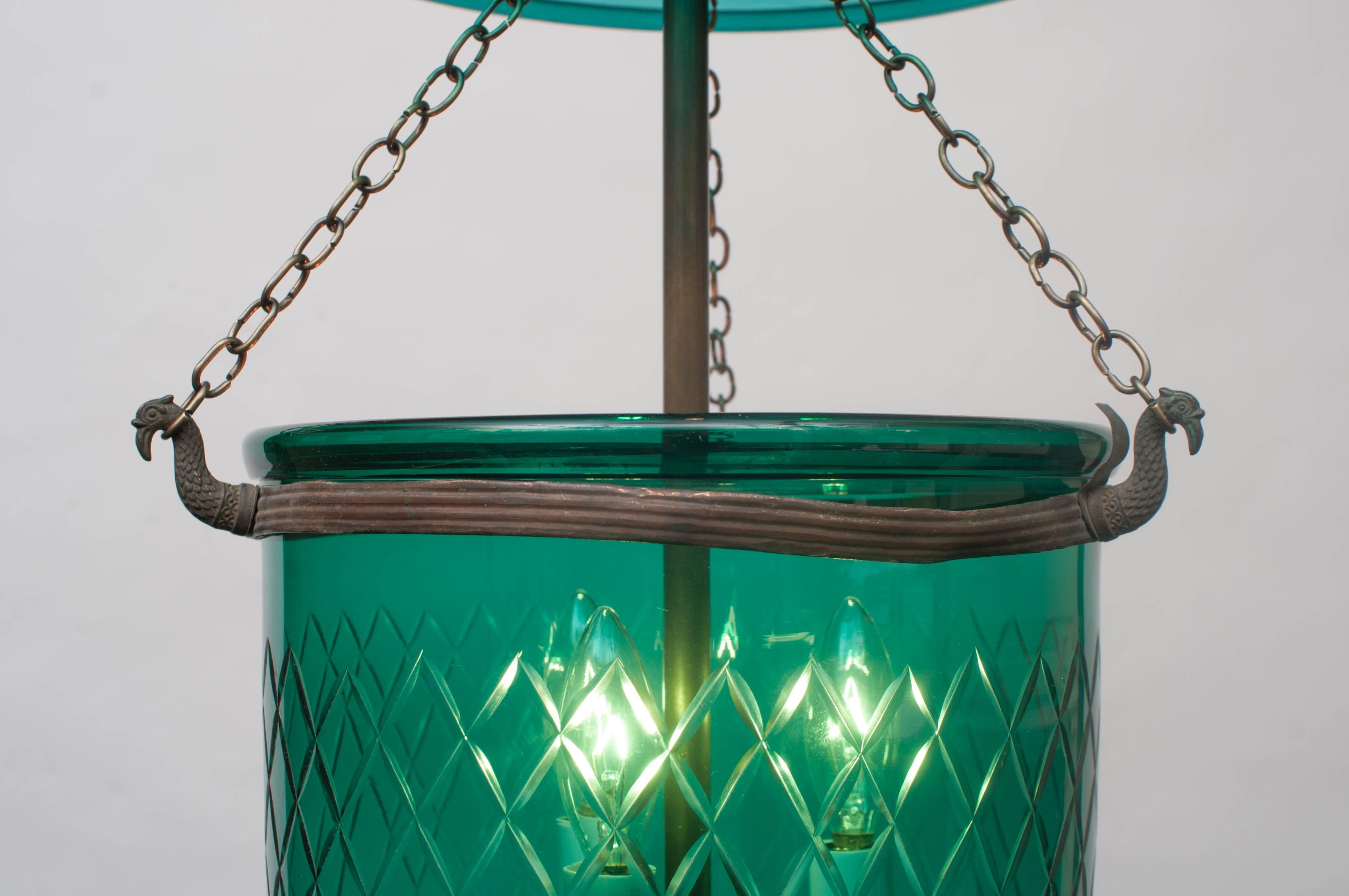 Handblown and cut with unique color and design - glass pontil (finial) - originally candle or oil-burning, now wired with three-light cluster electrical assembly - original brass components. Height can be adjusted. Ceiling cap, chain and hanging