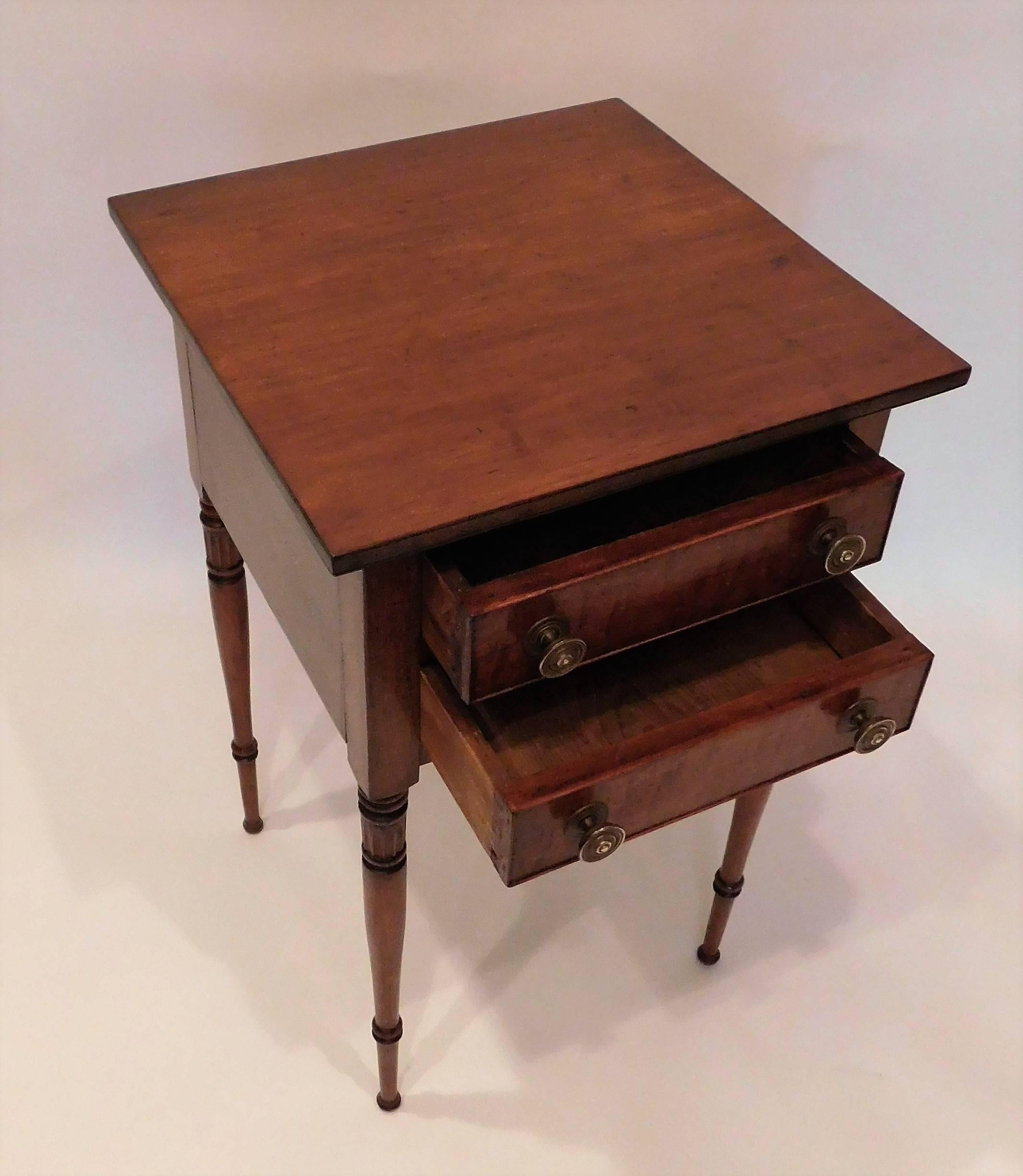 Charming two-drawer stand probably made in New York state or New England maple veneer on drawers.