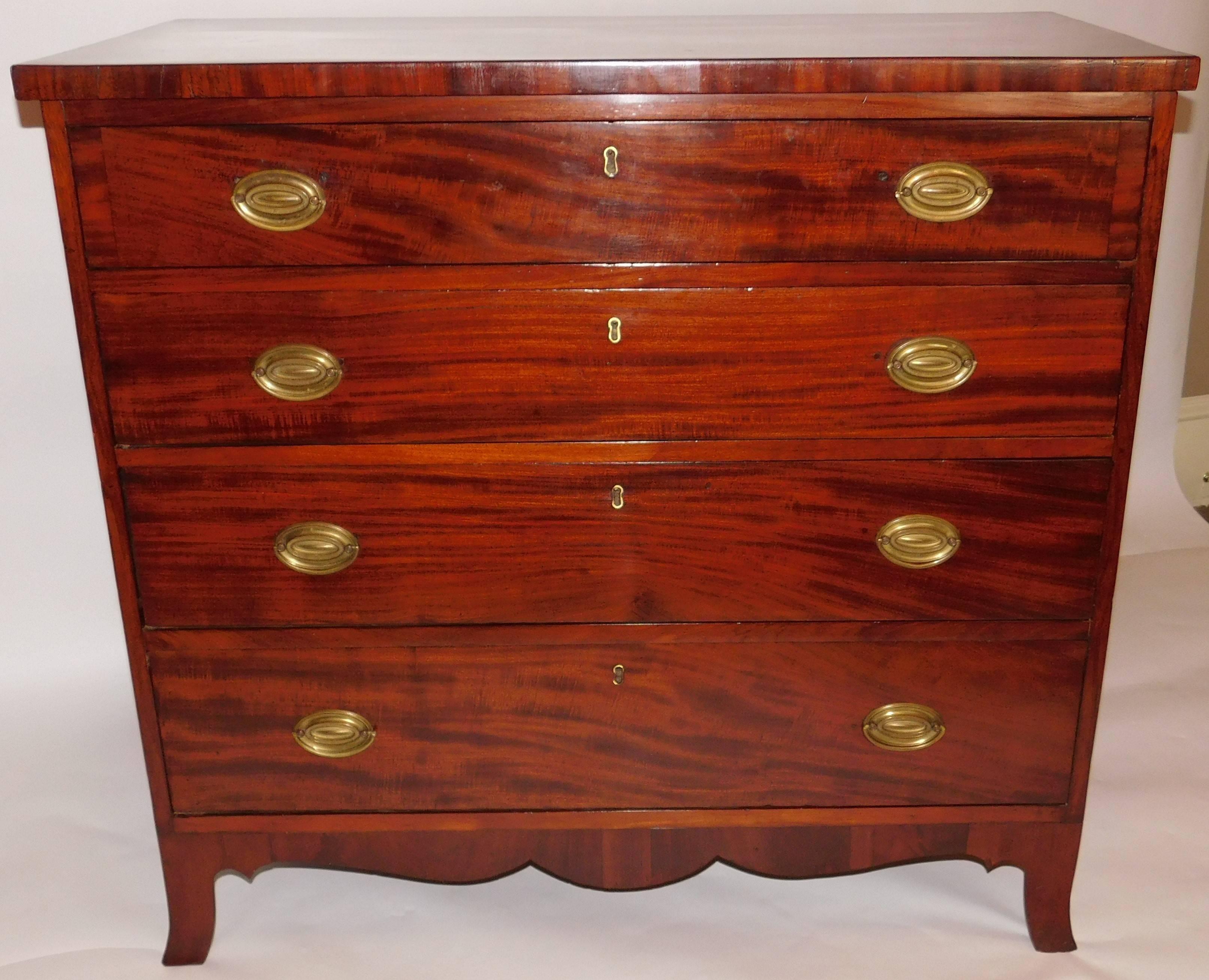 This Mid-Atlantic Federal piece was probably made in Virginia, mahogany and mahogany veneer with pine secondary wood, French polish, replaced solid brass hardware and banded end top drawer.