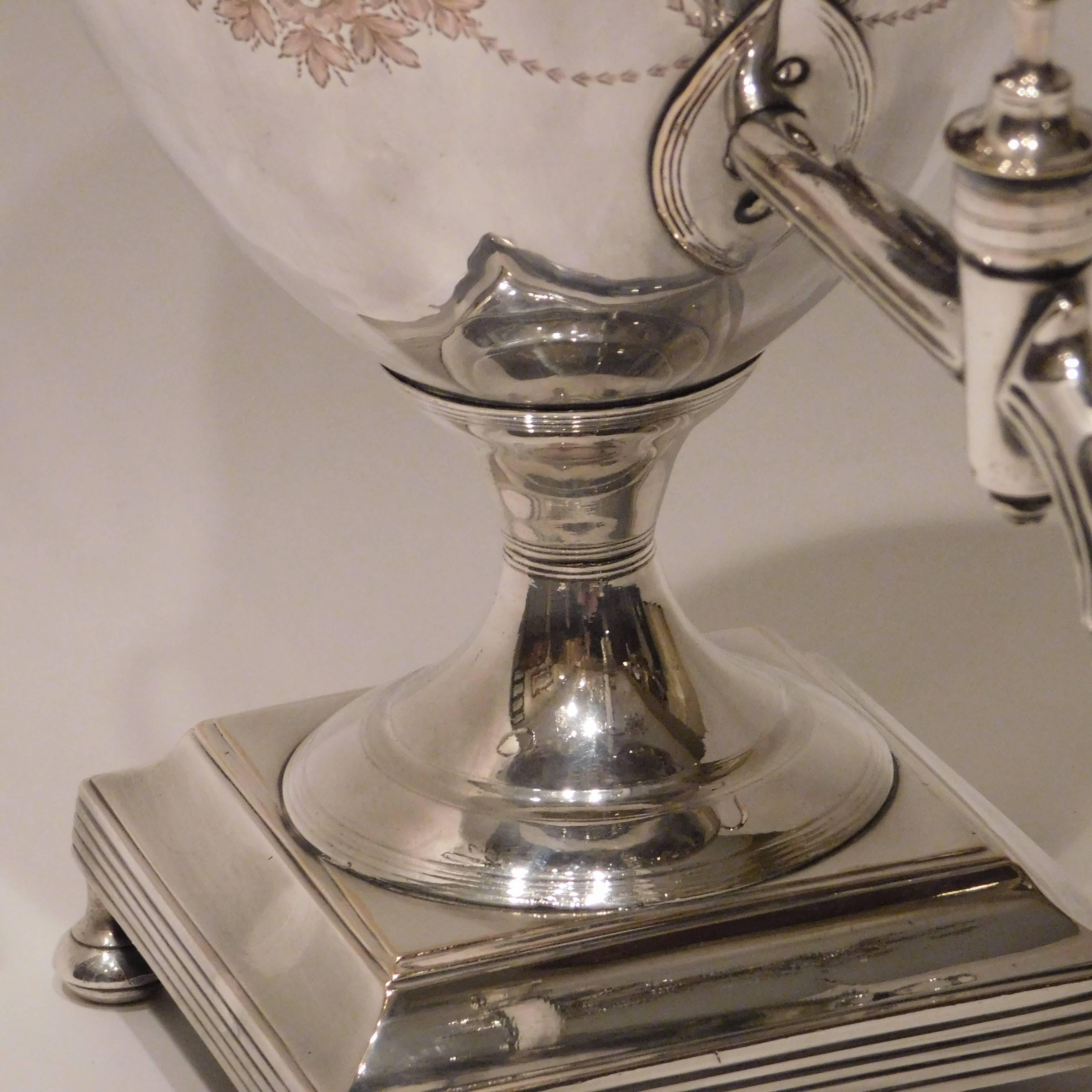 This silver on copper urn looks like it just came out of Downton Abbey, excellent hand chasing, neoclassic design.