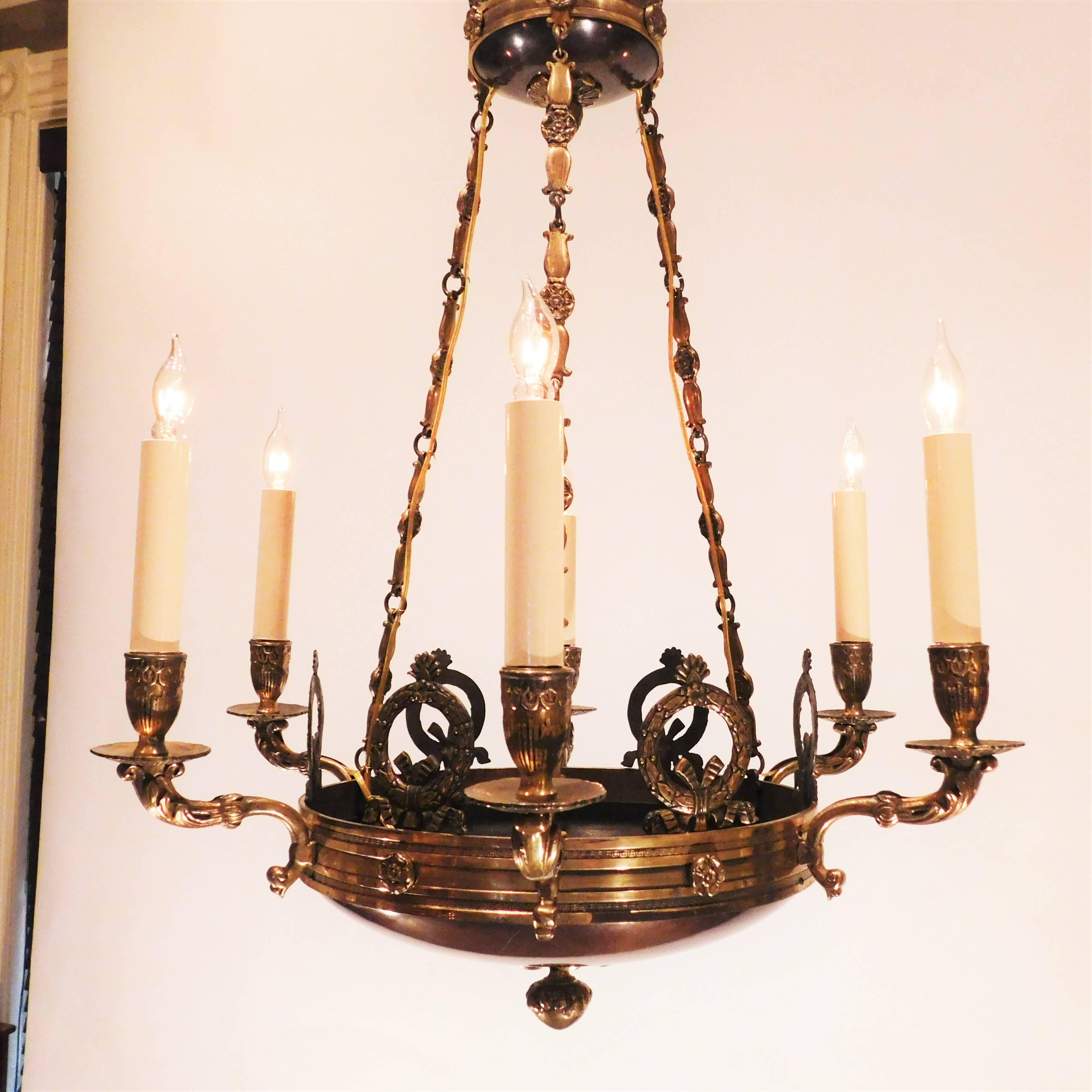 Beautiful mellow patina on the hand cast brass, main bowl and bottom of crown are a rich deep bronze color and quite reflective original chain connecting base and crown has unusual design, can be shortened by removing a link. Ceiling cap, hanging