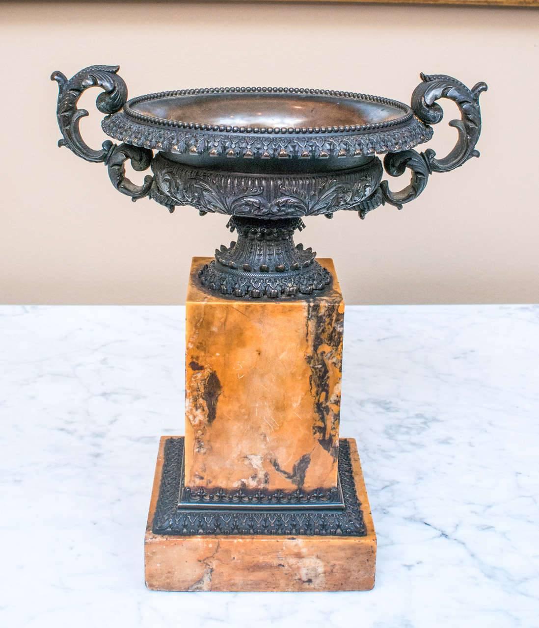Napoleon III bronze tazzas (urns) have very fine castings and are mounted on beautiful Broccatello di Siena marble plinths. Hallmarks on bottom bronze nut include trefoils and fleur de lis.