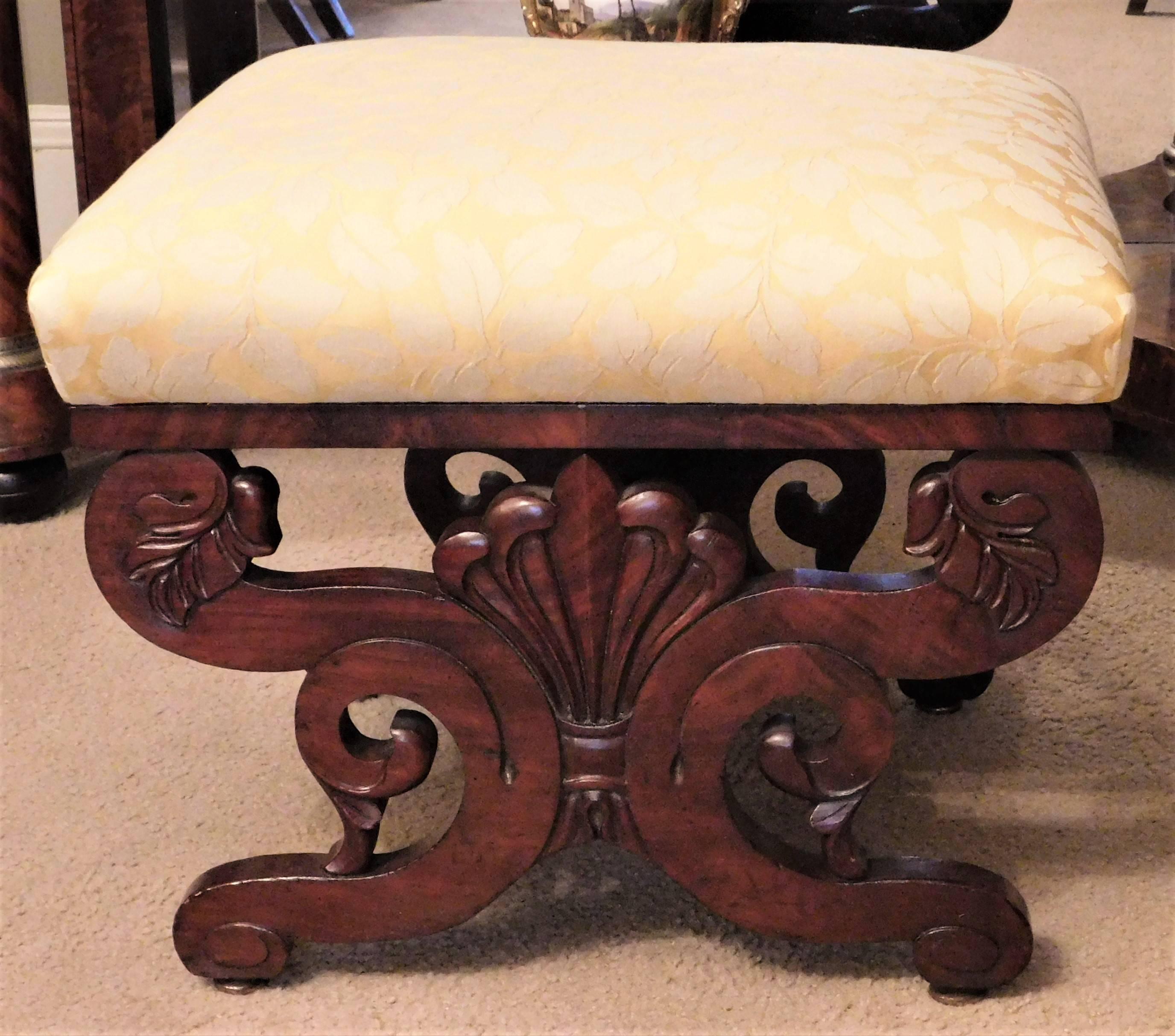 This Empire stool is mahogany and mahogany veneer with an upholstered seat. French polished. Sturdy and comfortable as seating or a footrest.