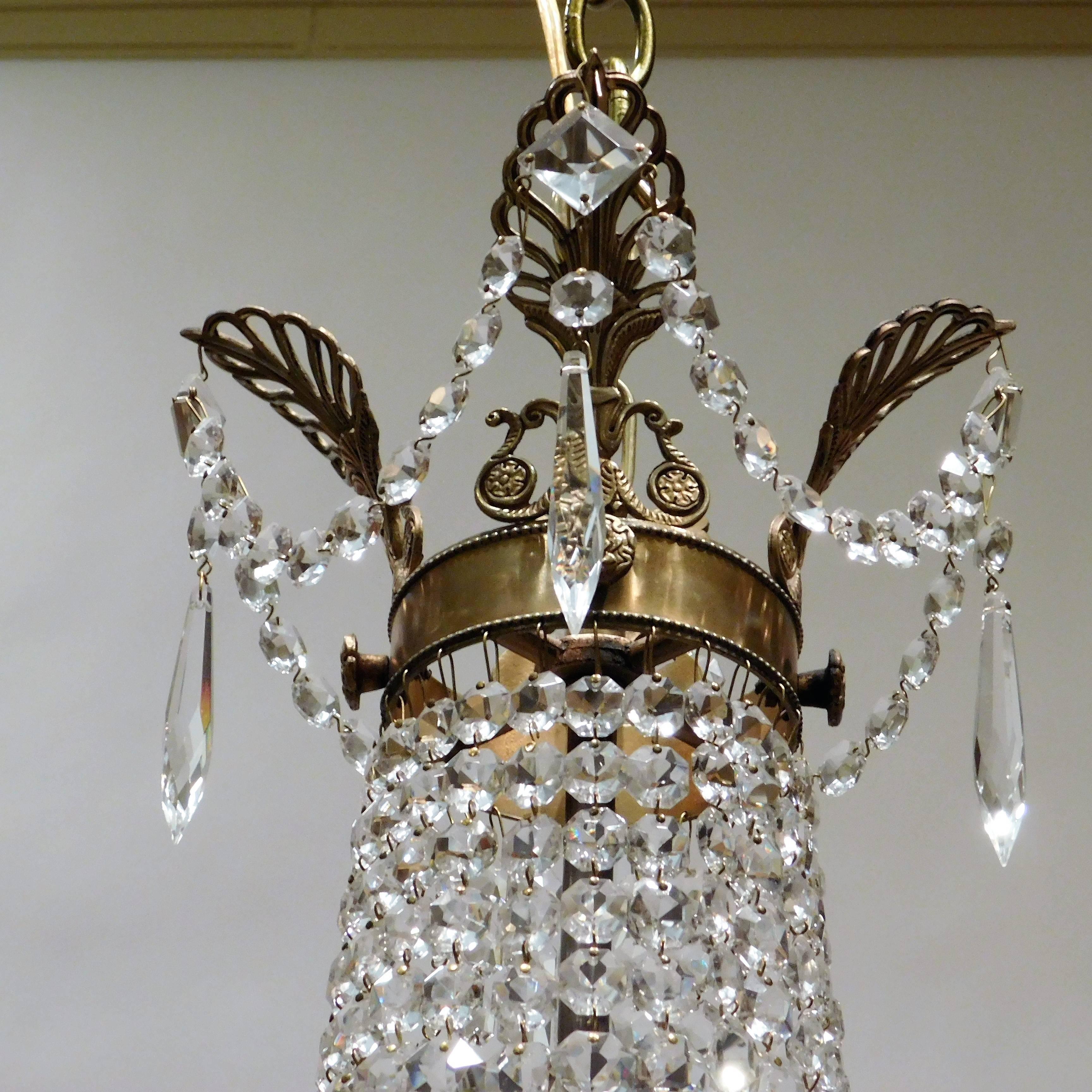 European Continental Empire Style Gilt Brass and Crystal Eight-Light Chandelier