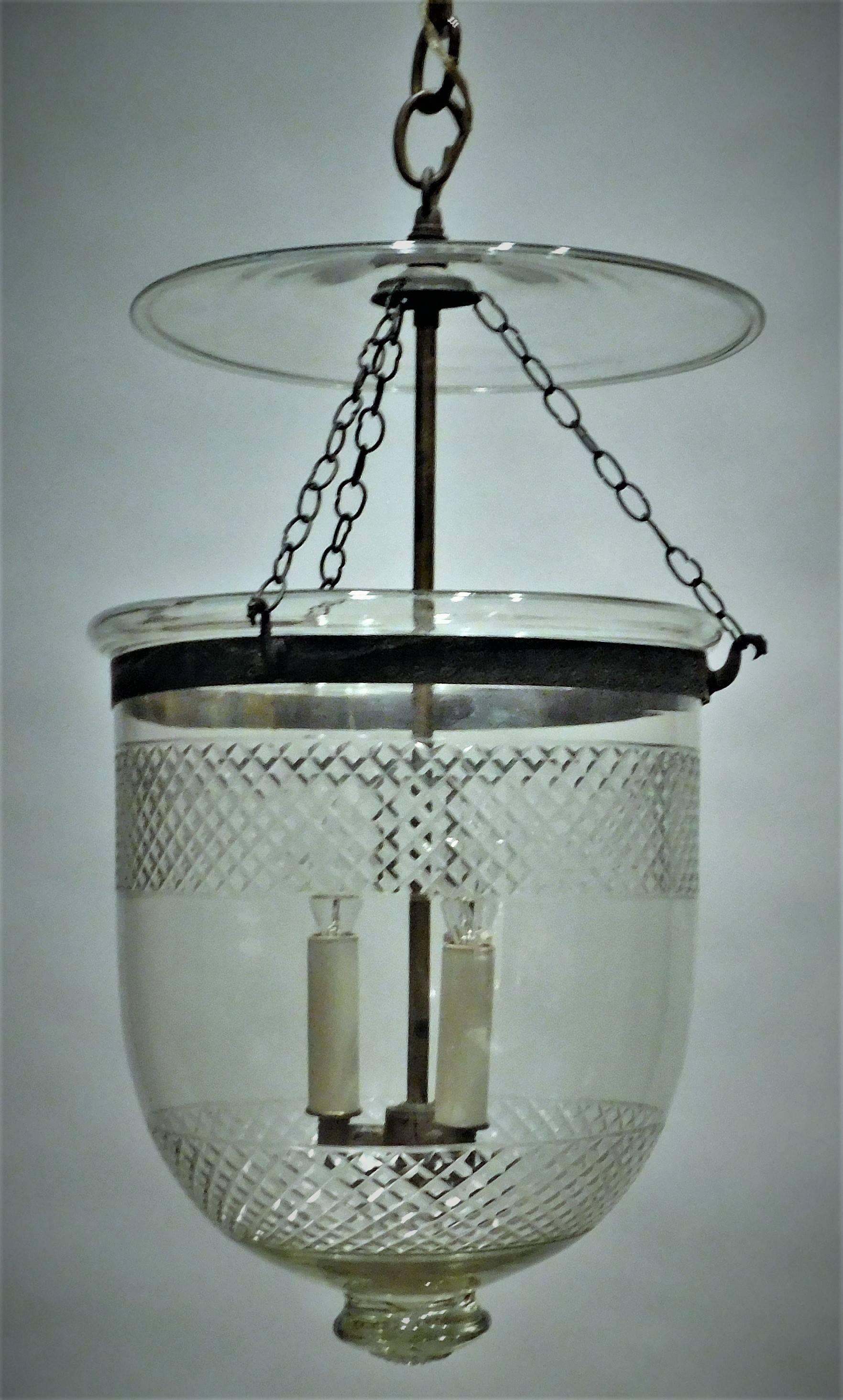 This handsome and very rare hand-blown lantern has 2 bands of hand-cut diamond pattern. Has its original brass ring. We have electrified the lantern with  a 3-light insert in solid brass, patinated to match the older brass fittings. Height can be