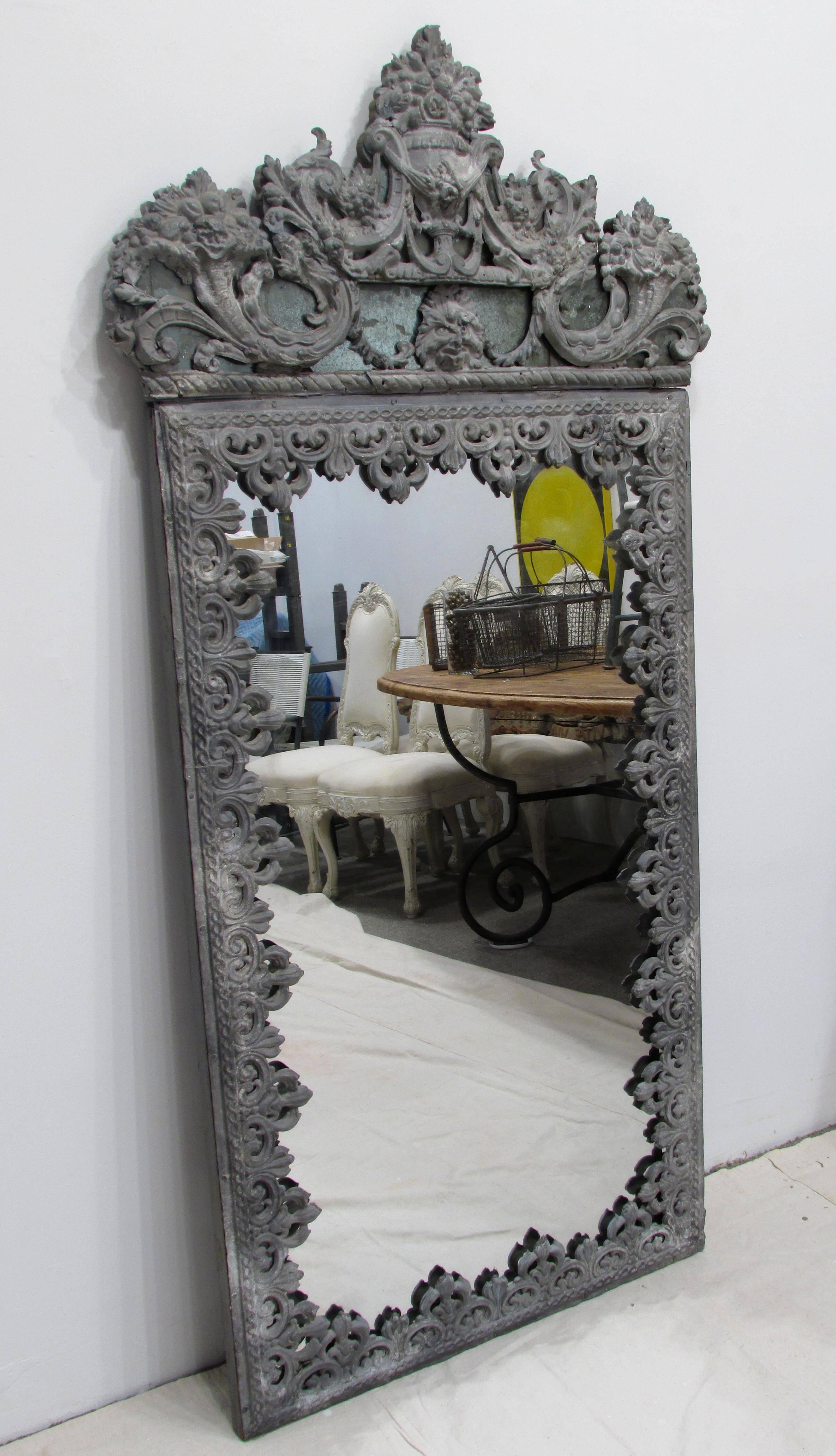 Large mirror with antique architectural zinc framing