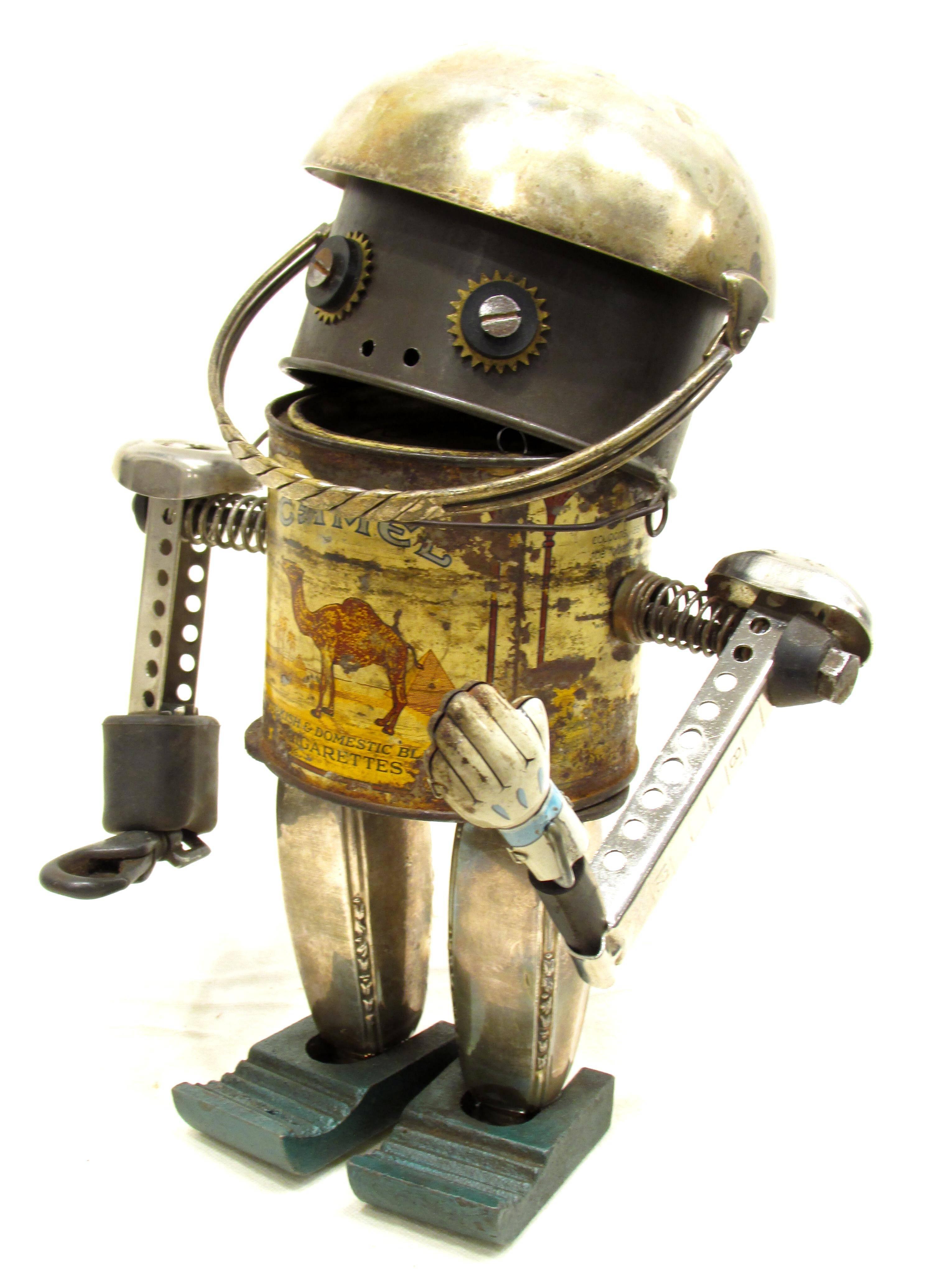Artist made robot from old antique Camel cigarettes tin and other objects artist signed with monogram.
