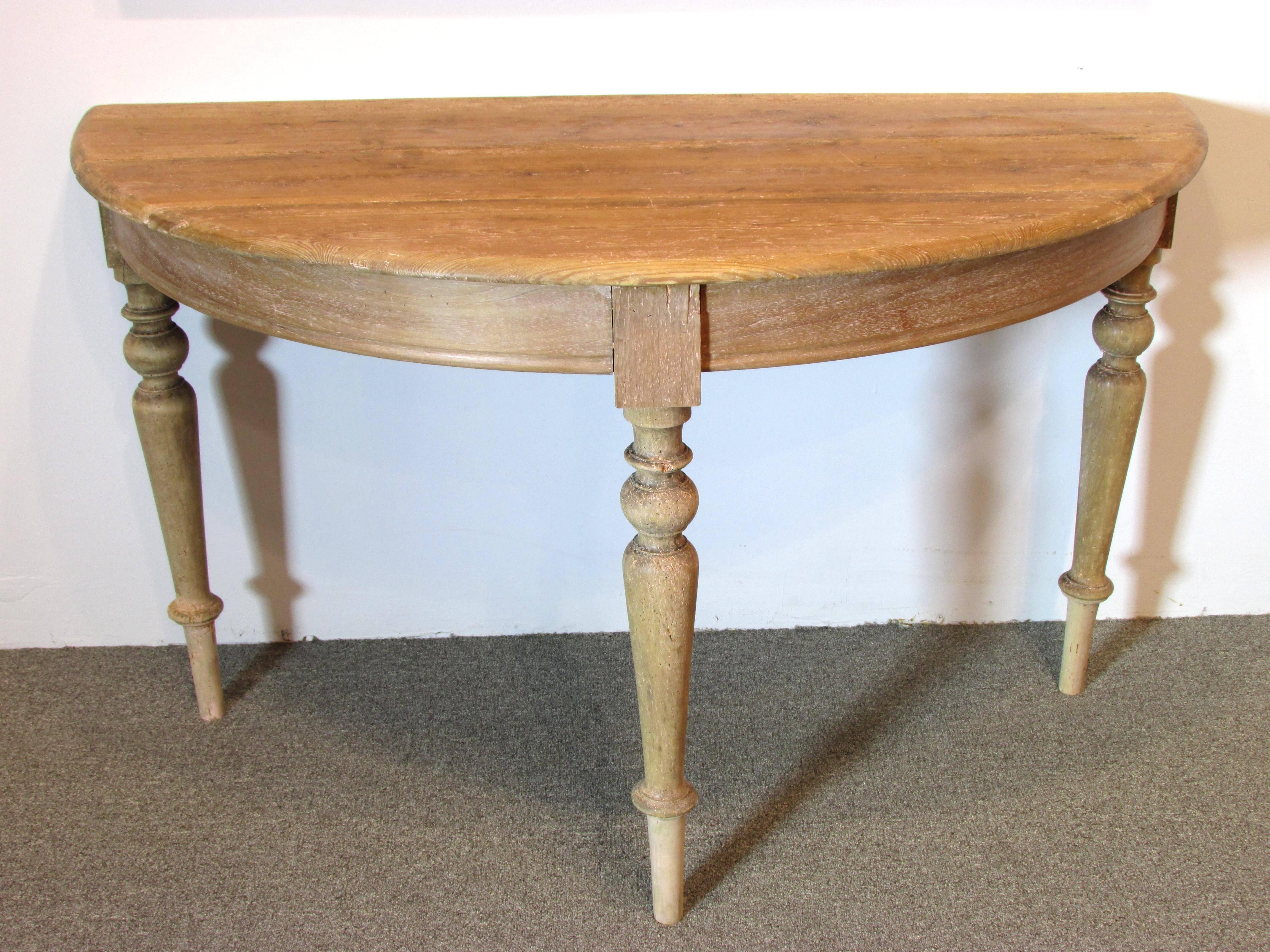 Pair of Southern American demilune tables that can be joined together for a round table scraped yellow pine top with mixed wood turned wood legs and base.