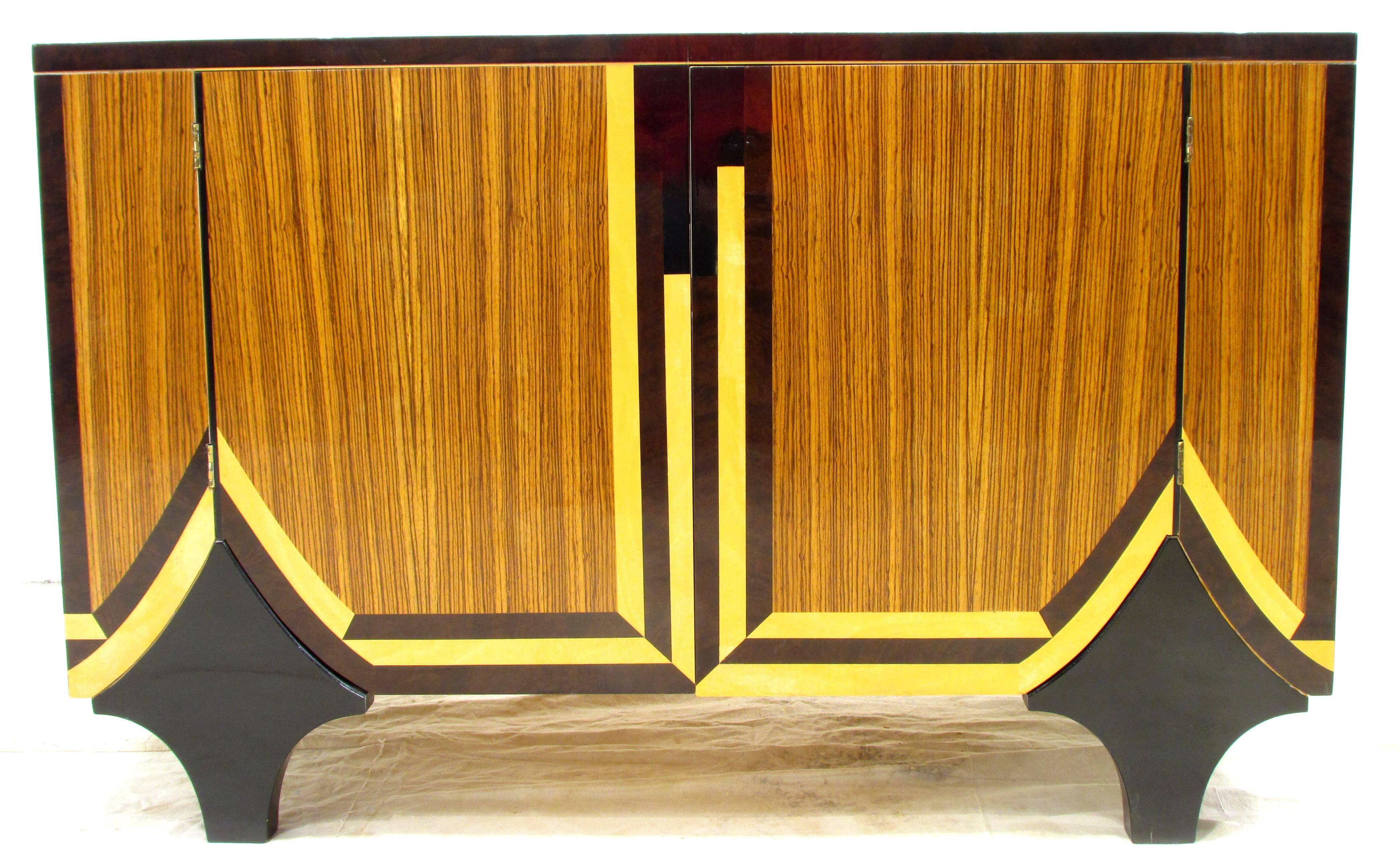 Beautiful Art Deco Revival style two-door cabinet inlaid with various exotic woods.