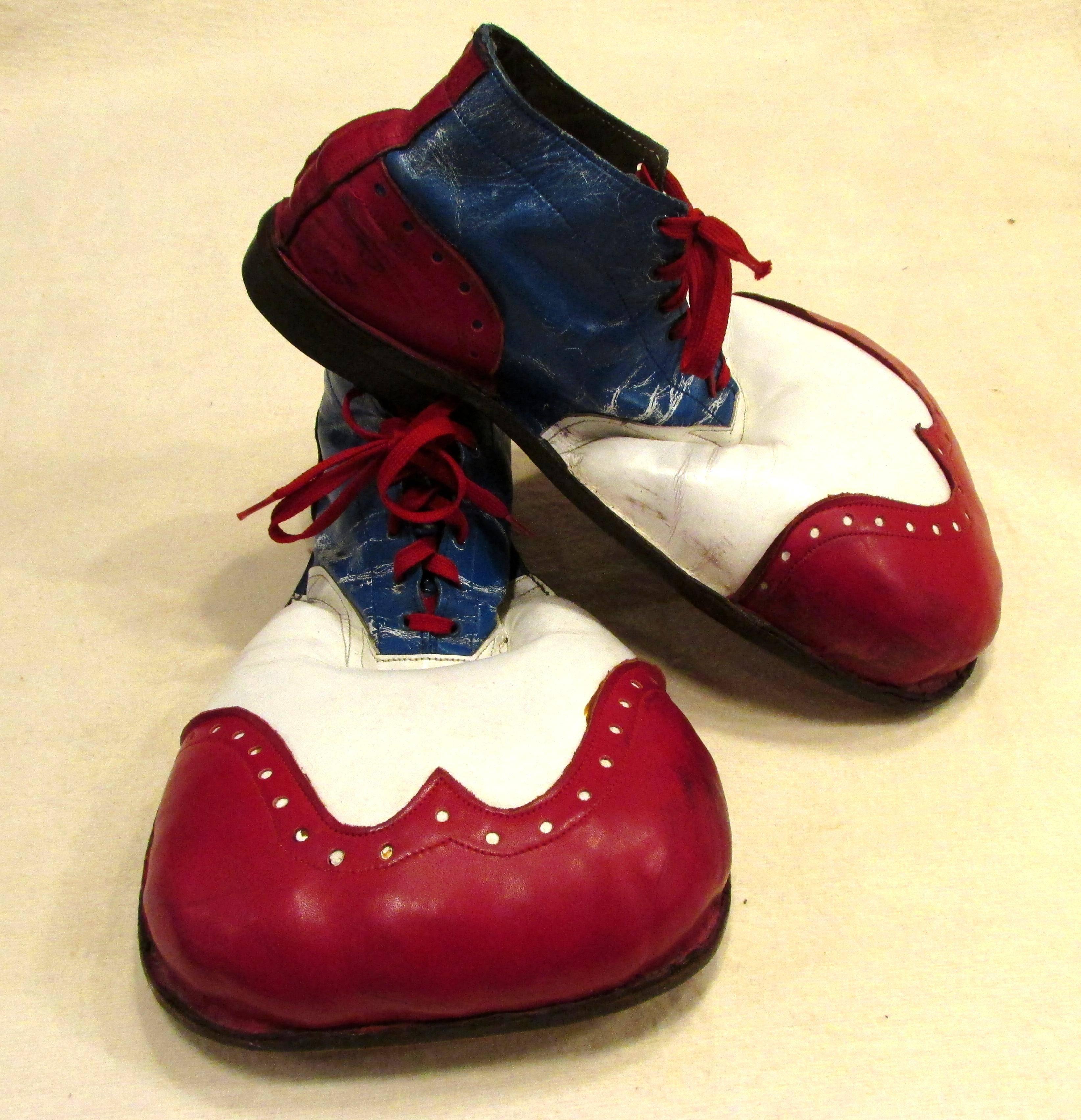 Pair of red white and blue leather vintage clown shoes with big toes and leather and rubber soles
From my collection of vintage Clown Shoes