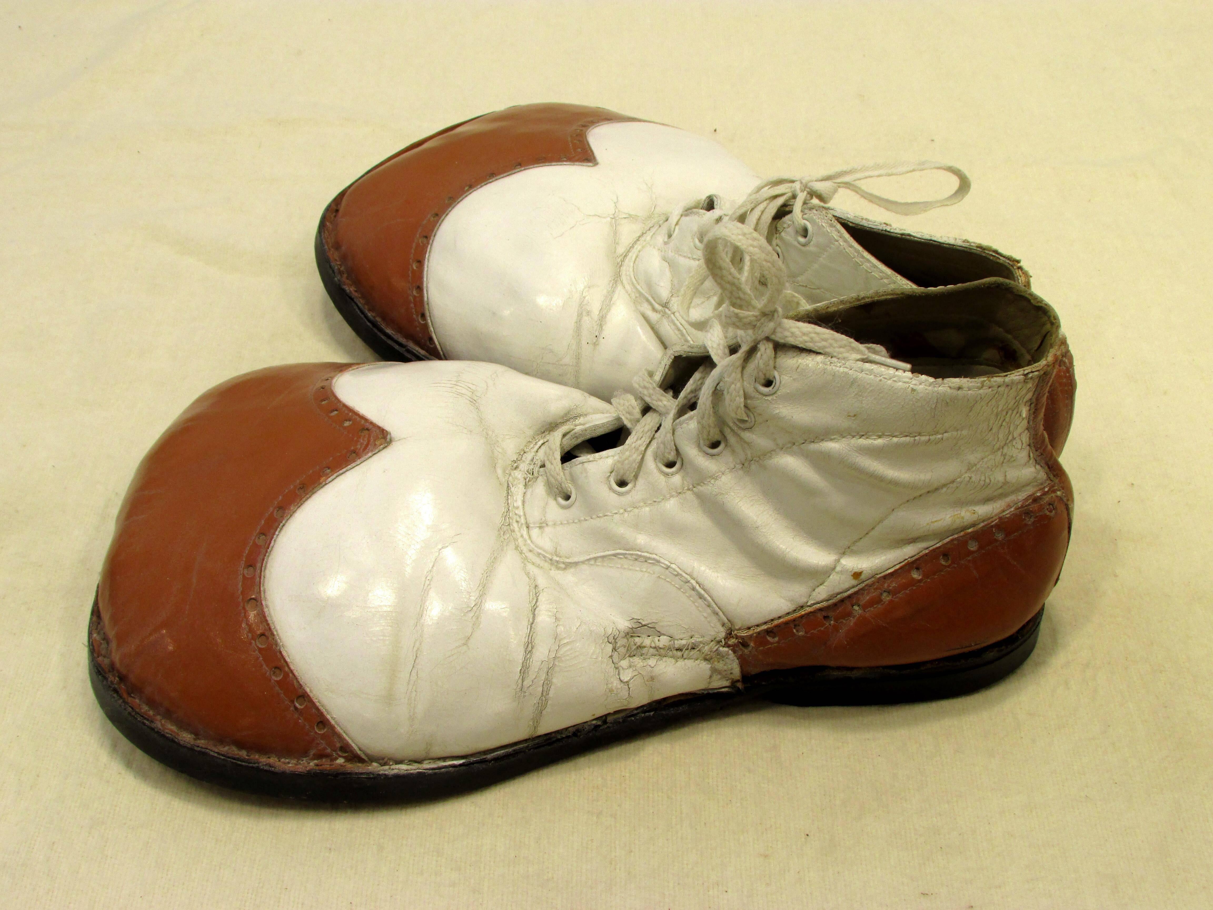 red and white clown shoes
