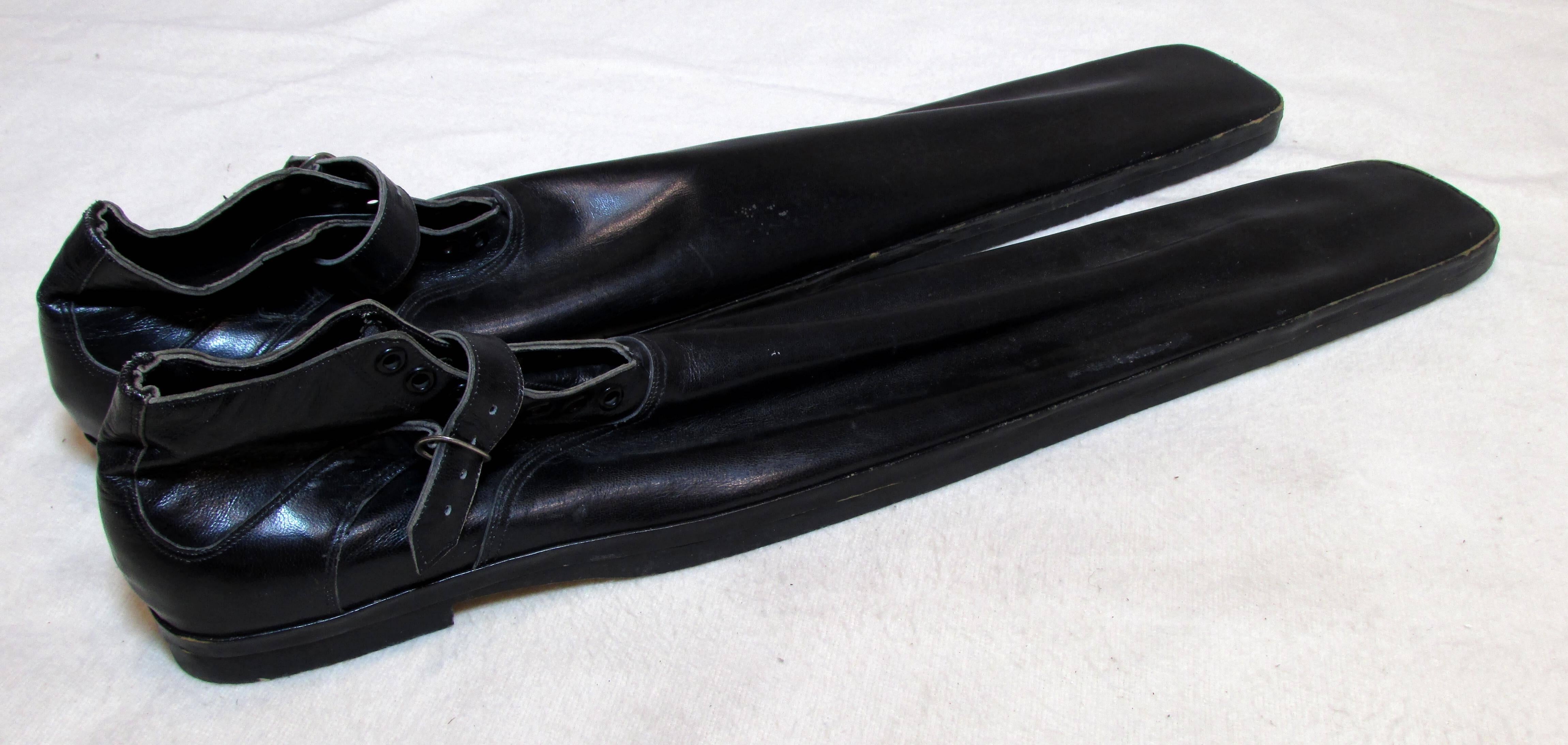 Very long pair of black leather vintage clown shoes with wooden sole this style was made famous by 