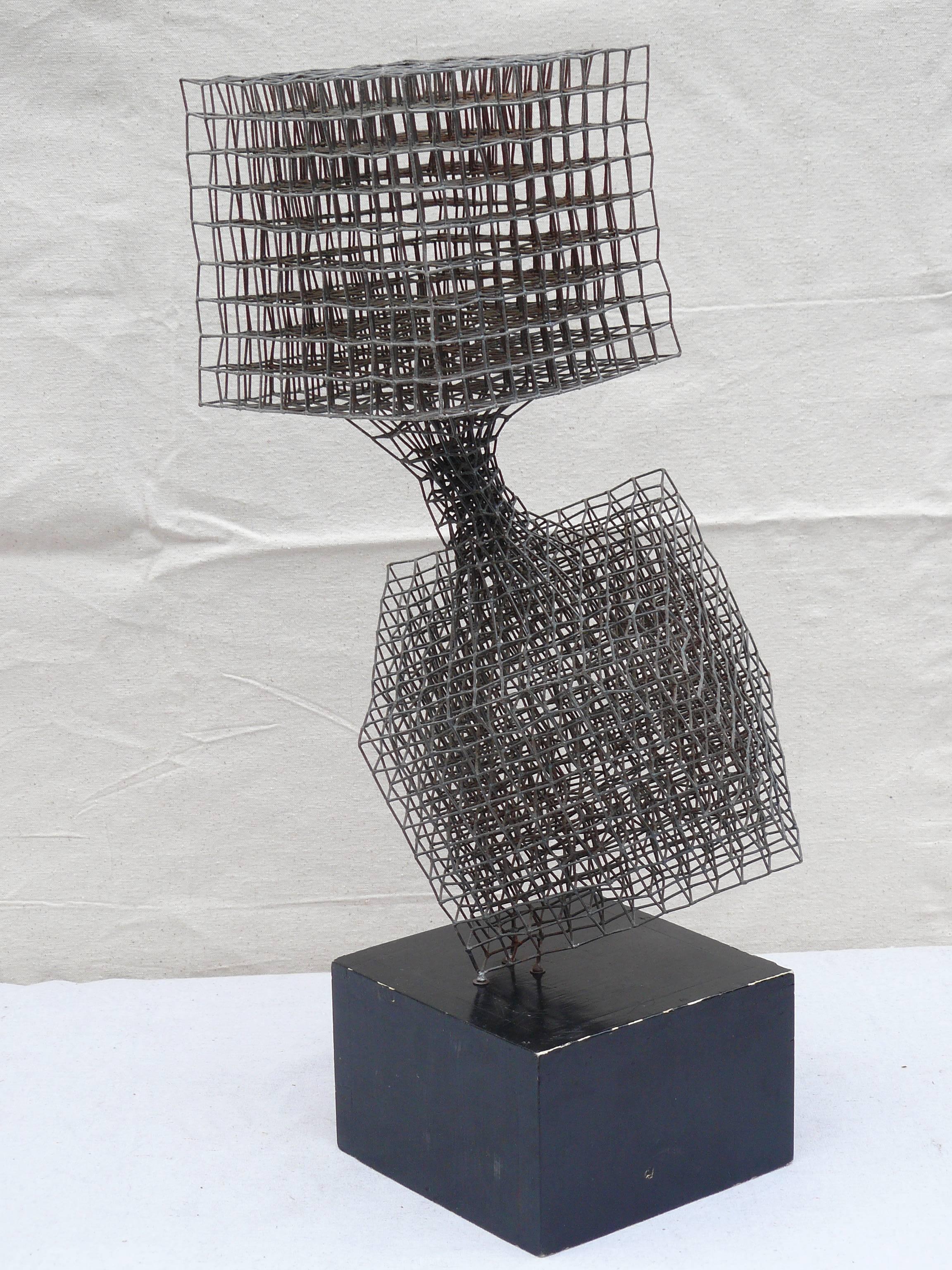 A geometric abstract wire sculpture titled 