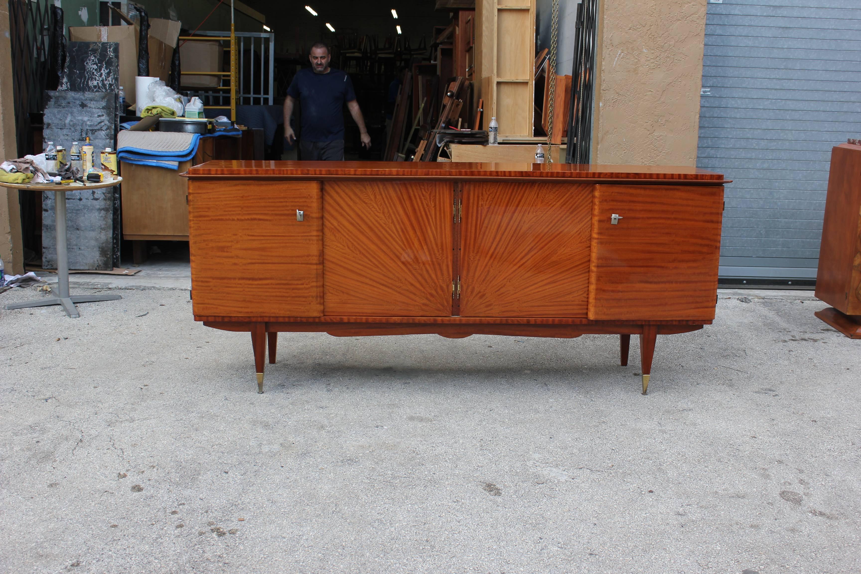 French Art Deco exotic mahogany sunburst sideboard, credenza or buffet high gloss finish and inside sycamore wood, please note these buffets can be taken apart to accommodate elevator needs if necessary.