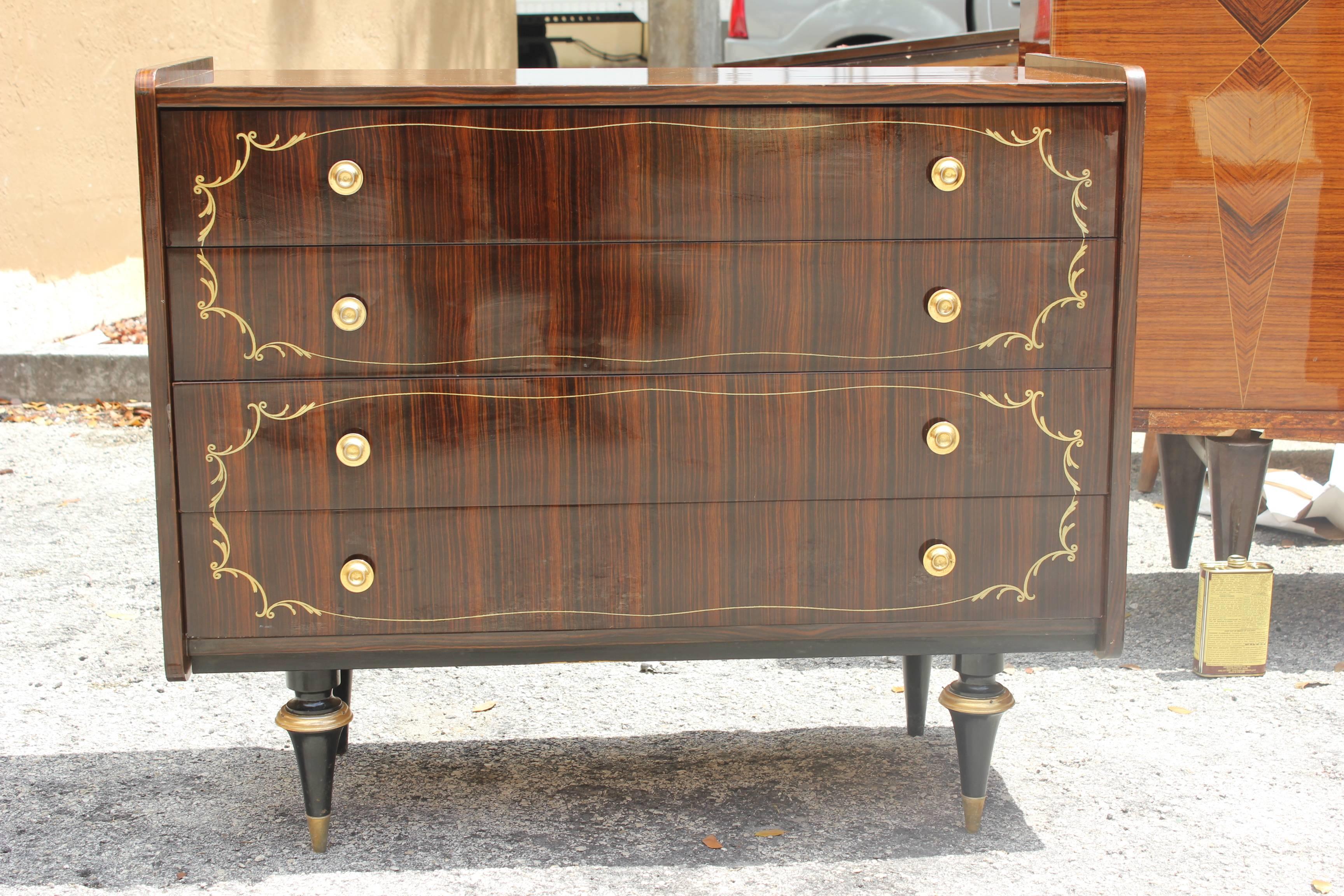 A stunning French Art Deco exotic Macassar ebony four-drawer dresser, circa 1940s. Beautiful inlay and detail. Excellent condition.