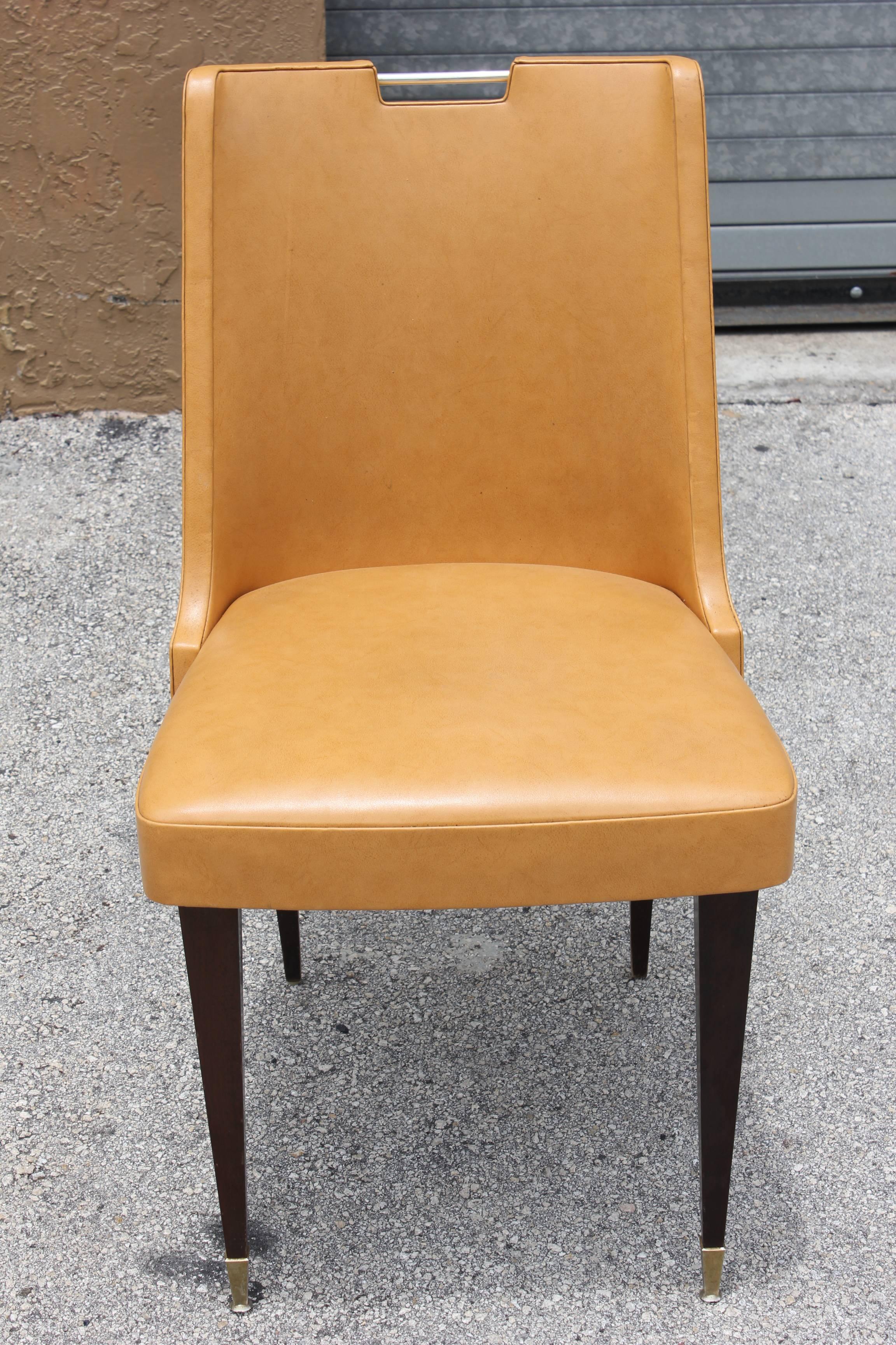 A spectacular set of six French Art Moderne dining chairs, circa 1940s. Reupholstery recommended. Nickel detail.