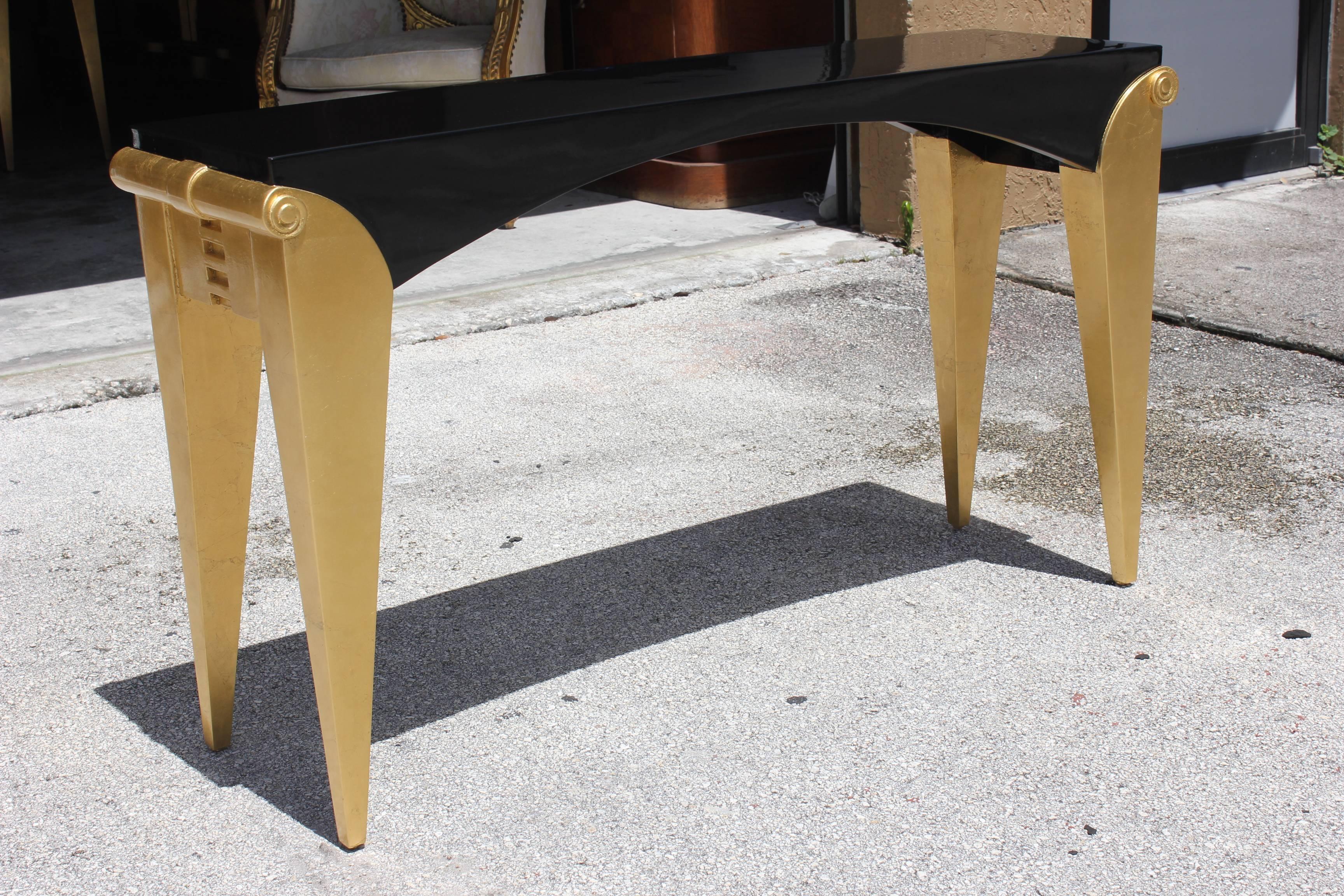 Pair of French Art Deco Giltwood/ Black Lacquered Console Tables, circa 1940s In Excellent Condition In Hialeah, FL