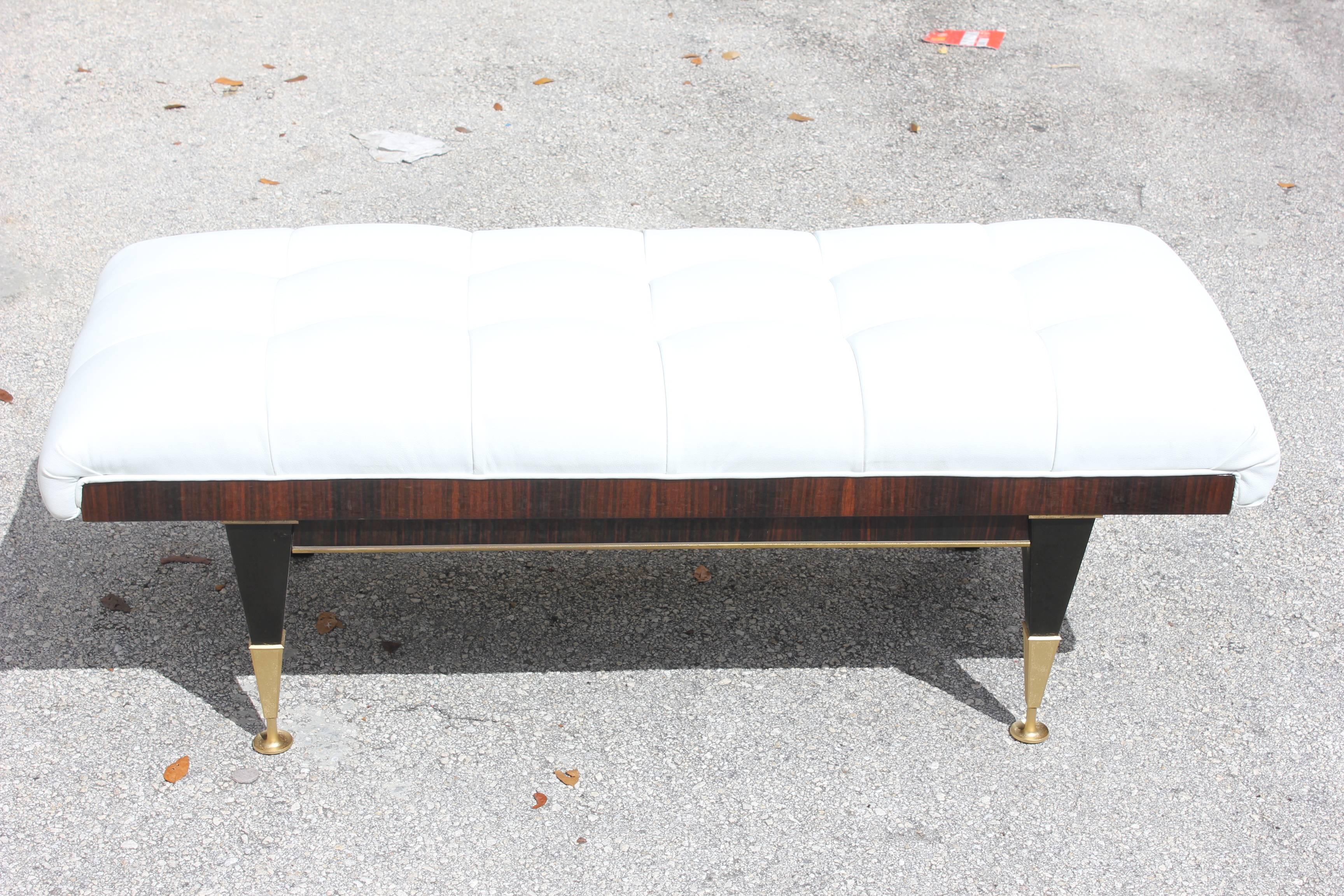 A French Art Deco exotic Macassar ebony "Petite" sitting bench, circa 1940s. Newly upholstered and refinished.