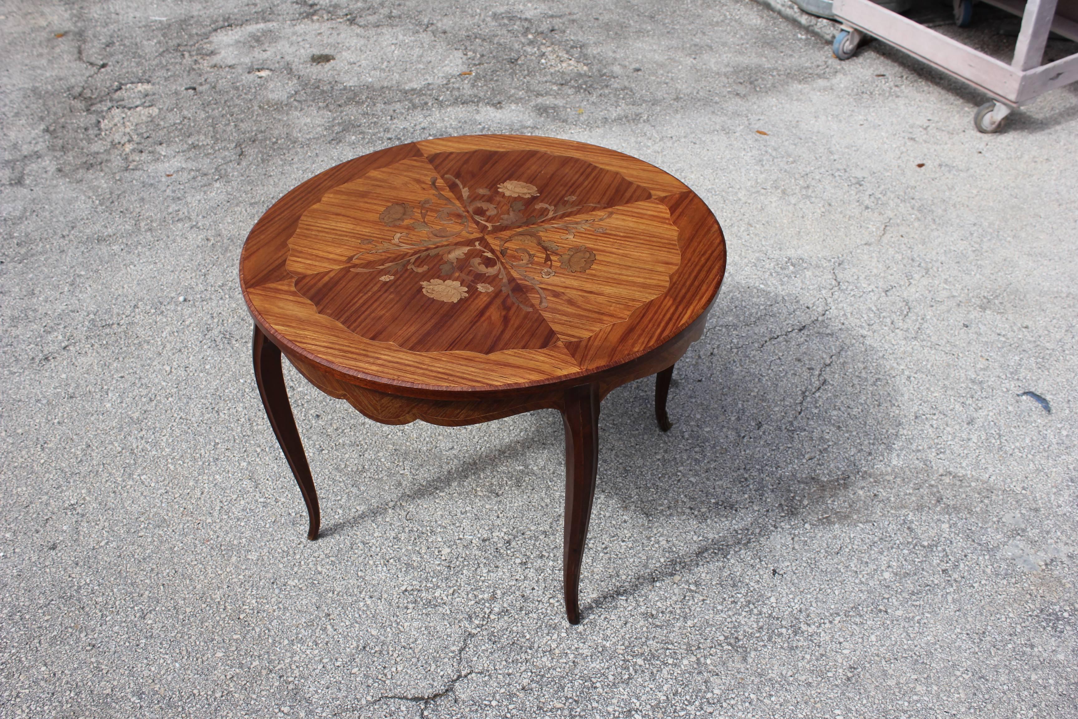 French Art Deco period accent or gueridon or side table, circa 1930. Exotic Mahogany that rest on makes it ideal next to a chair or for use as a bedside table. A fine example of Classic, French Art Deco, this table is from France, Paris.