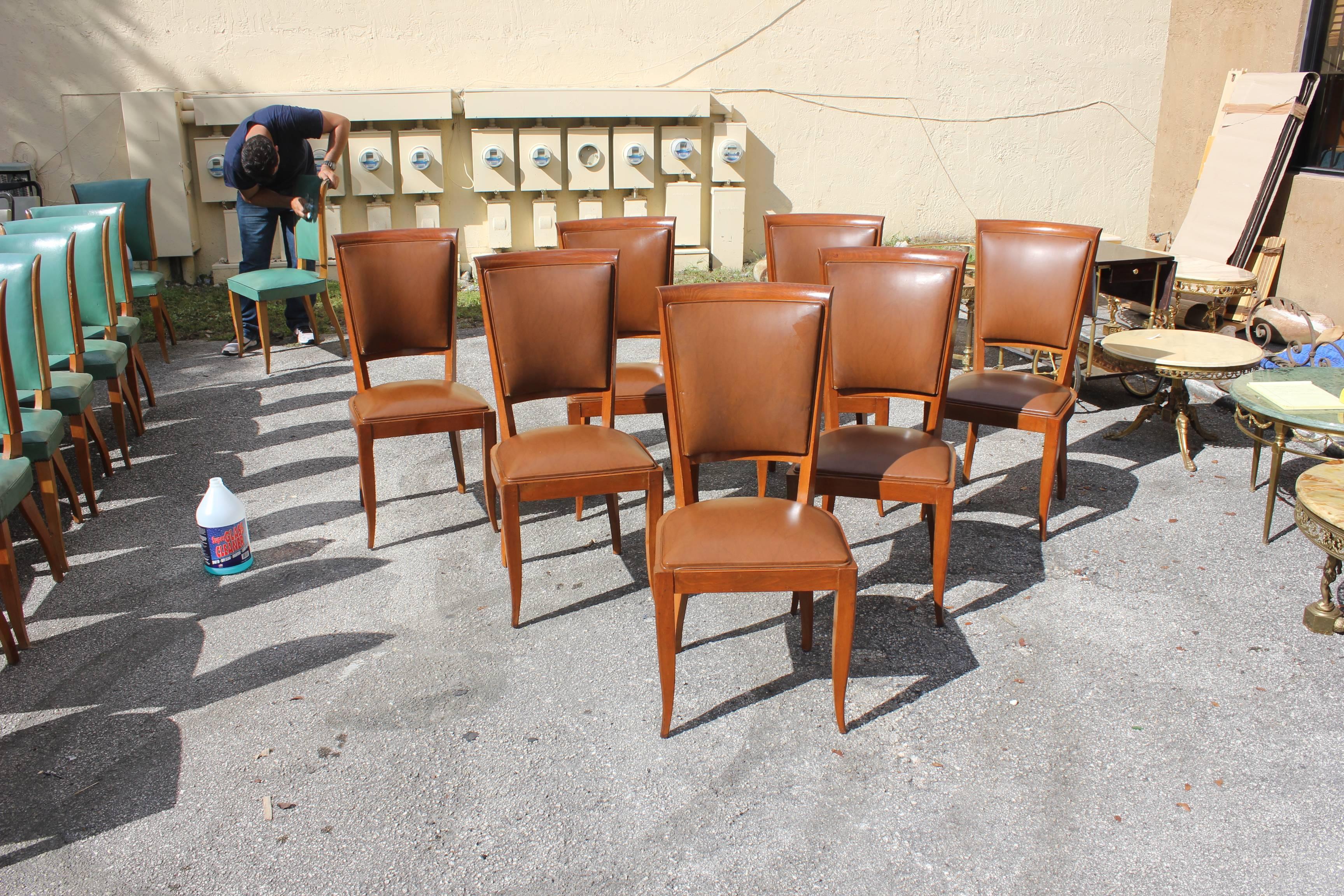 A set of seven French art deco solid mahogany dining chairs circa 1940. (reupholstery is vinyl recommended for all seven dining chairs ). The chair frames are in excellent condition, size 16.0