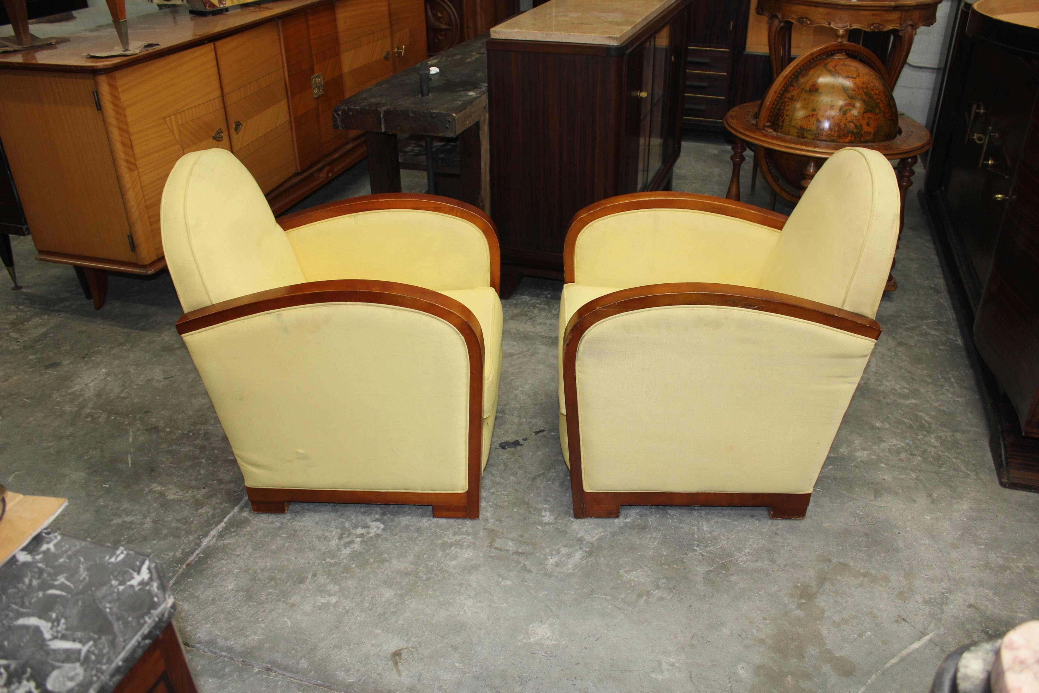 This exceptional pair French art deco speed armchairs feature in solid mahogany, chair frames are in excellent condition, circa 1940s. These chairs came from a French hotel. We traveled to buy all our pieces in France .We bought this beautiful club