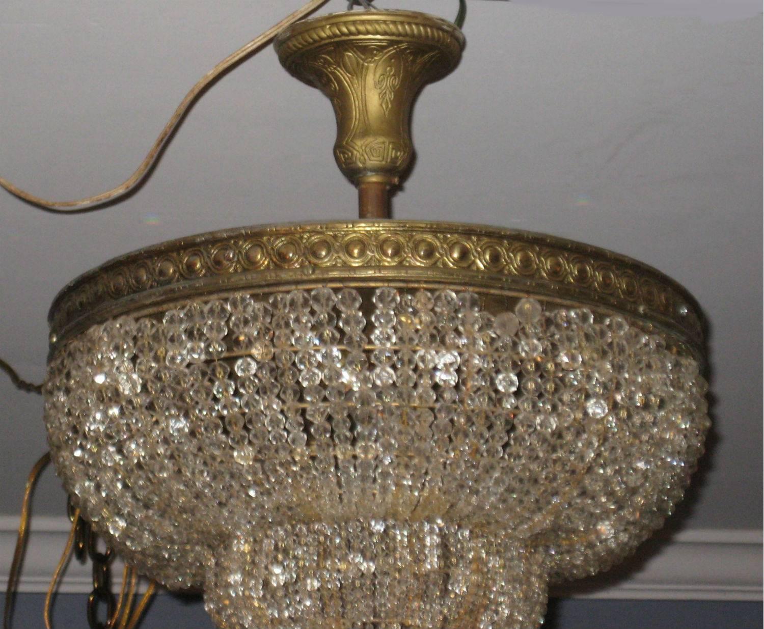 Bronze and beaded crystal basket chandelier. H: 20