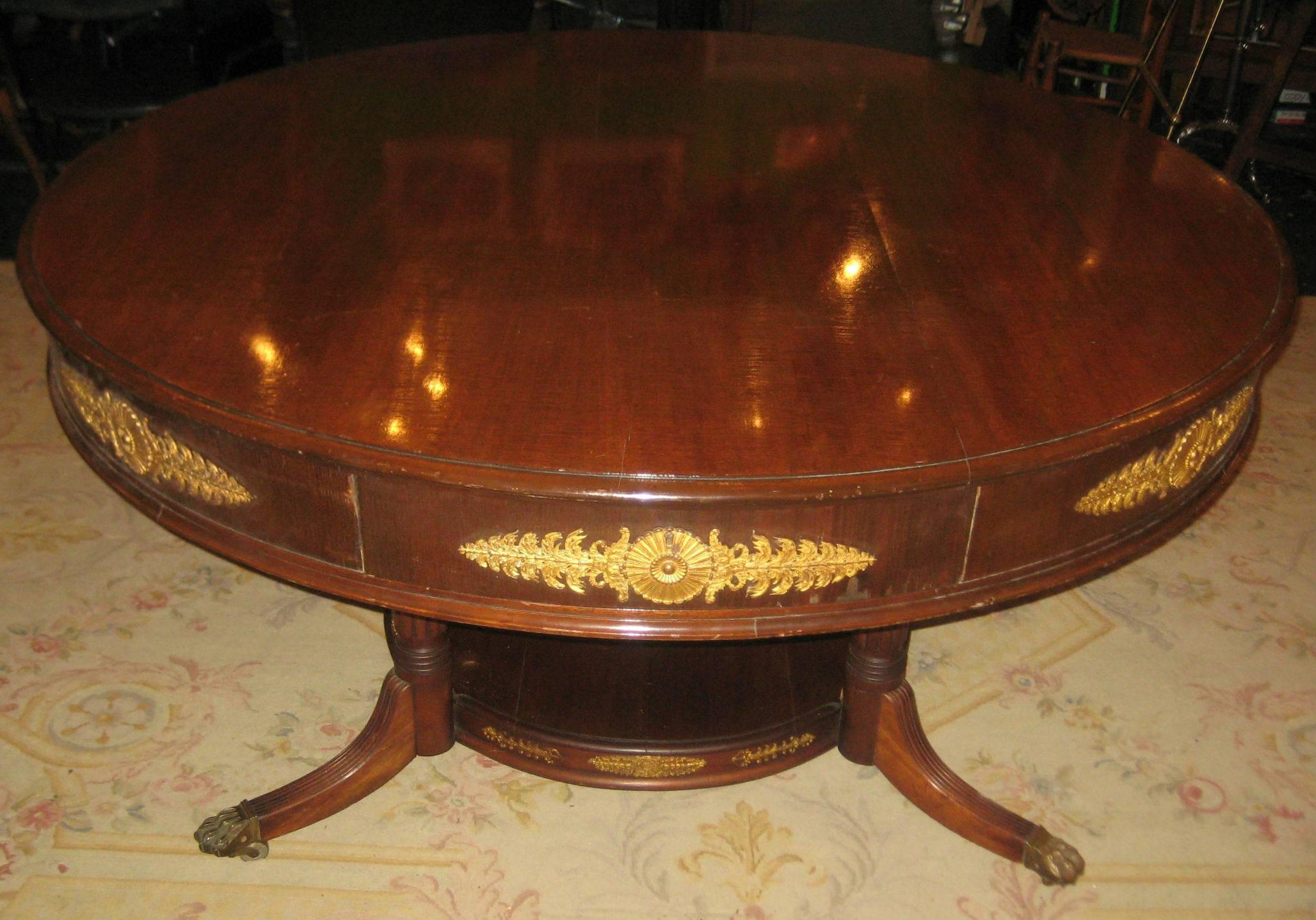19th Century French Empire Mahogany and Gilt Bronze-Mounted Four-Drawer Center Table For Sale