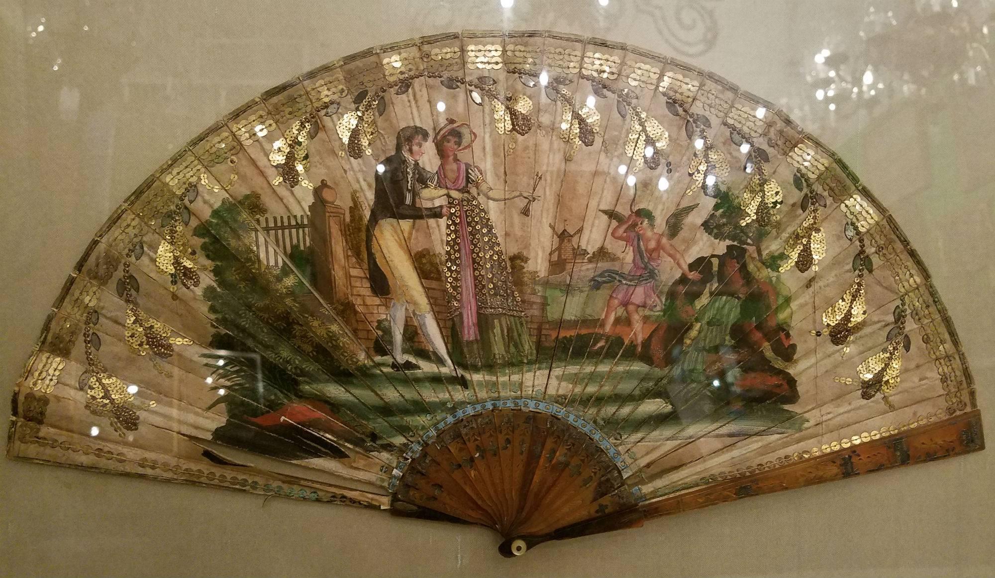 French hand-painted fan in a shadow box frame. Framed: H 15.25, W 22.75