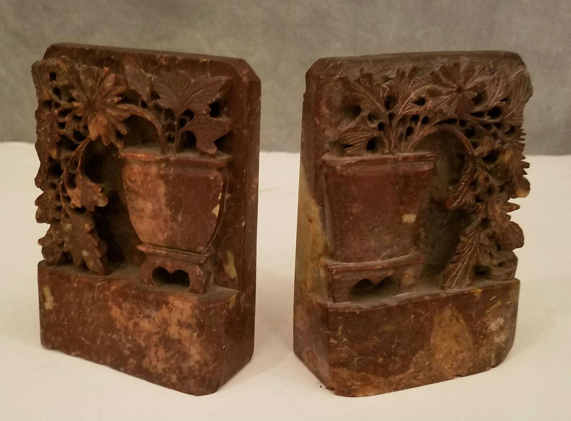 Collection of Chinese carved soapstone pieces, comprised of:

Pair of bookends (H: 5.25