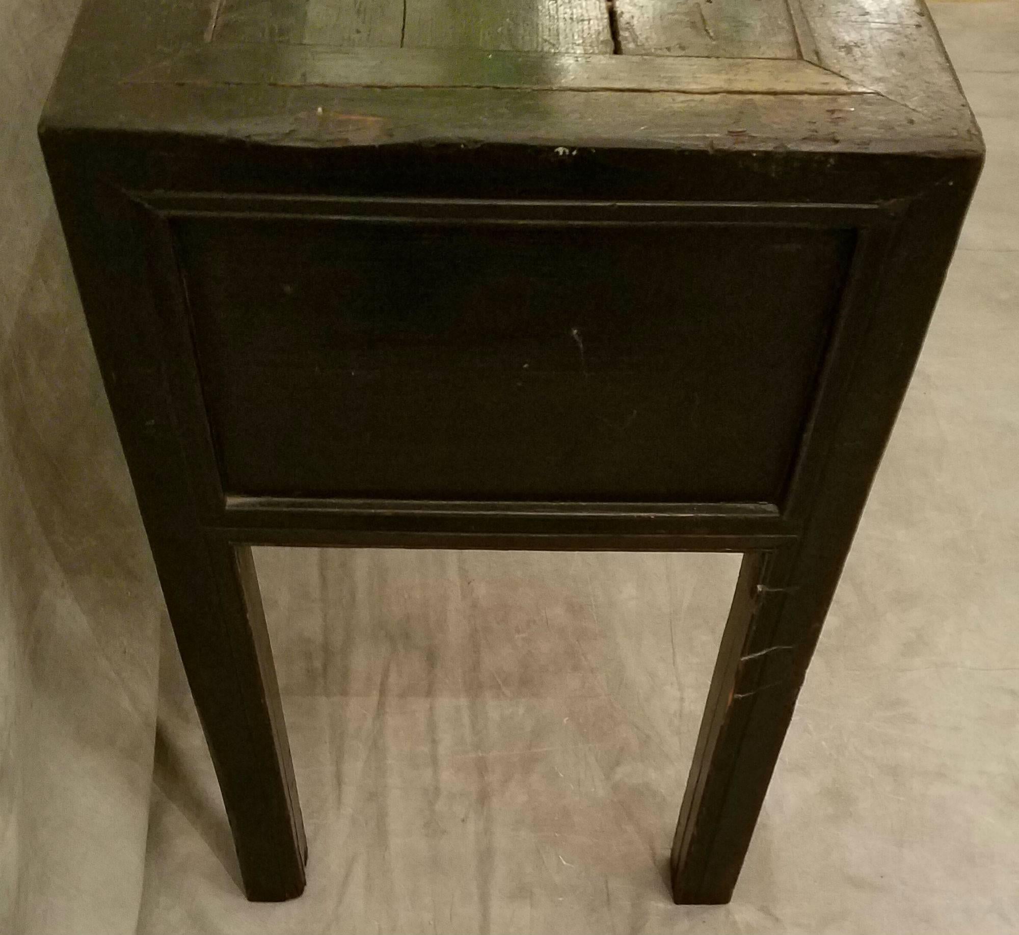 Antique Chinese black lacquer three-drawer desk.