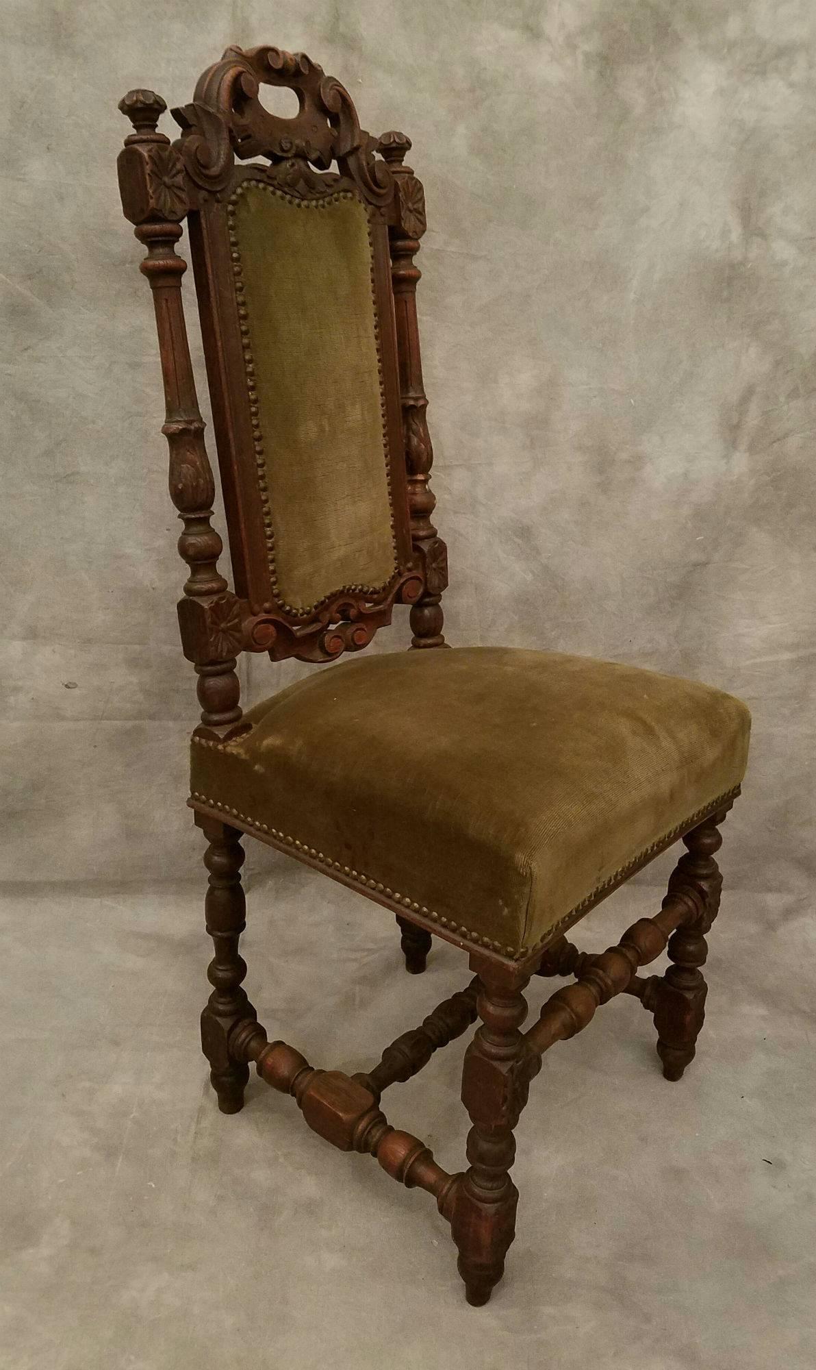 Set of six Renaissance carved oak dining chairs.
