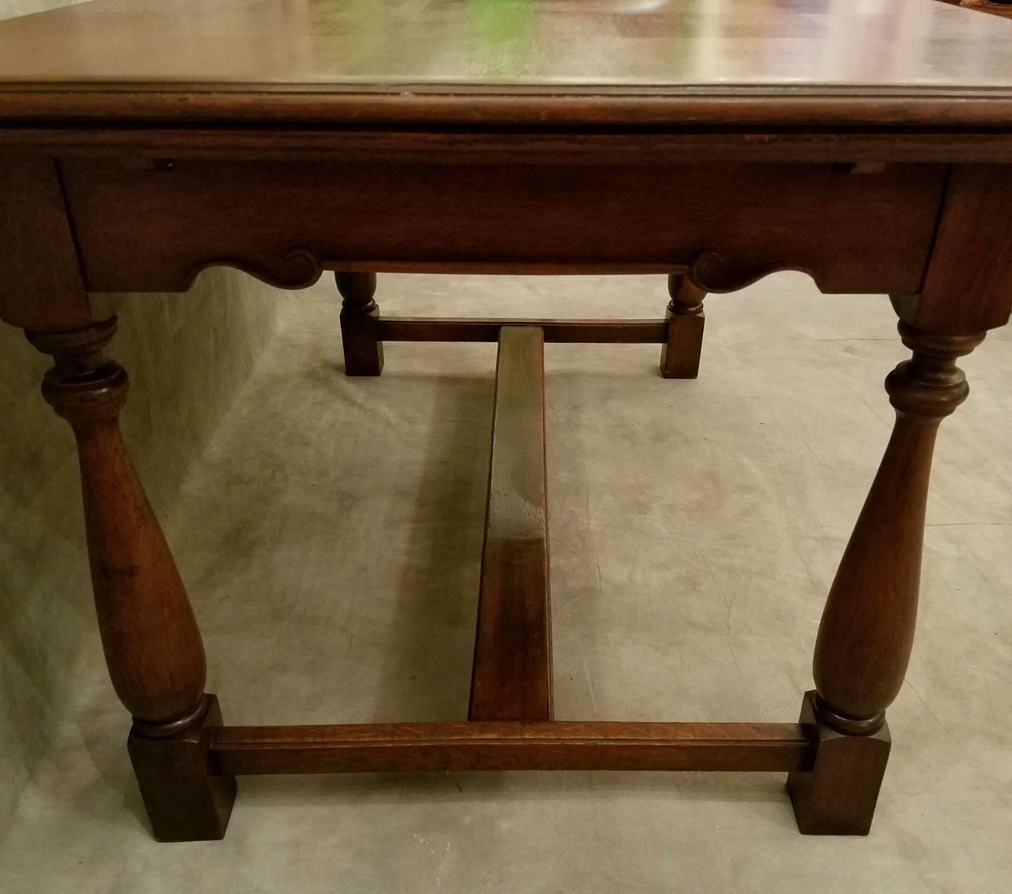 Country French carved oak refectory dining table with parquetry top. 

Measures: Height 31