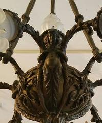 Bronze and Satin Glass Seven-Light Chandelier with Caryatid Figures