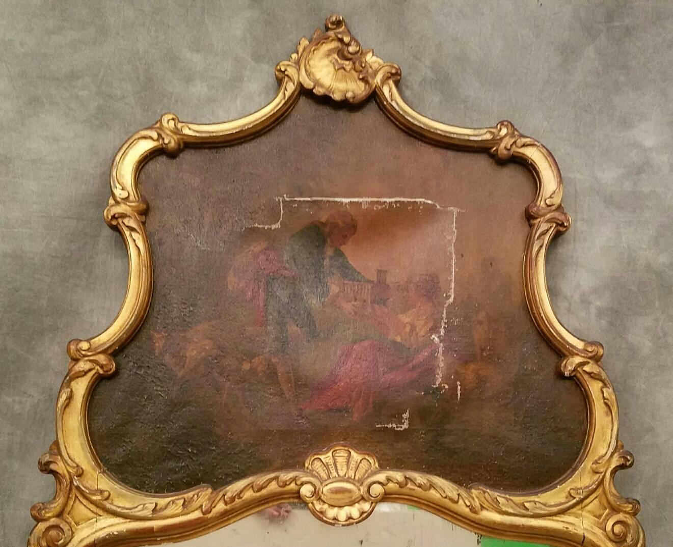 Louis XV carved giltwood trumeau mirror.