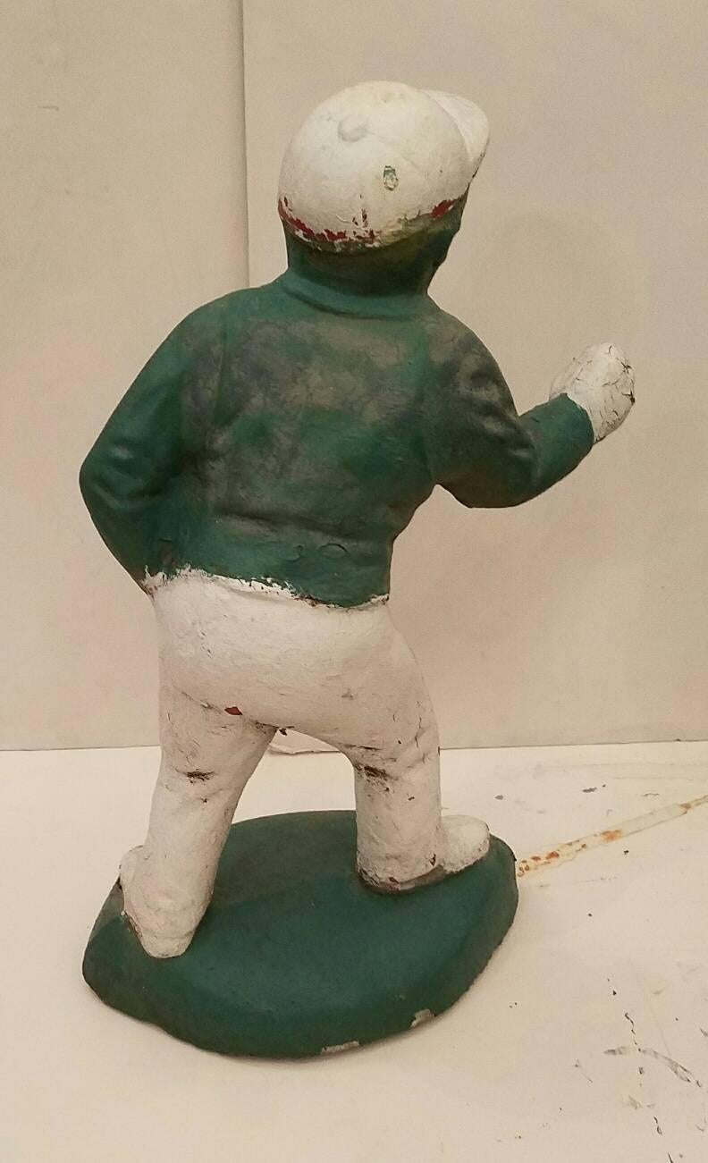Black Americana cast concrete lawn jockey.