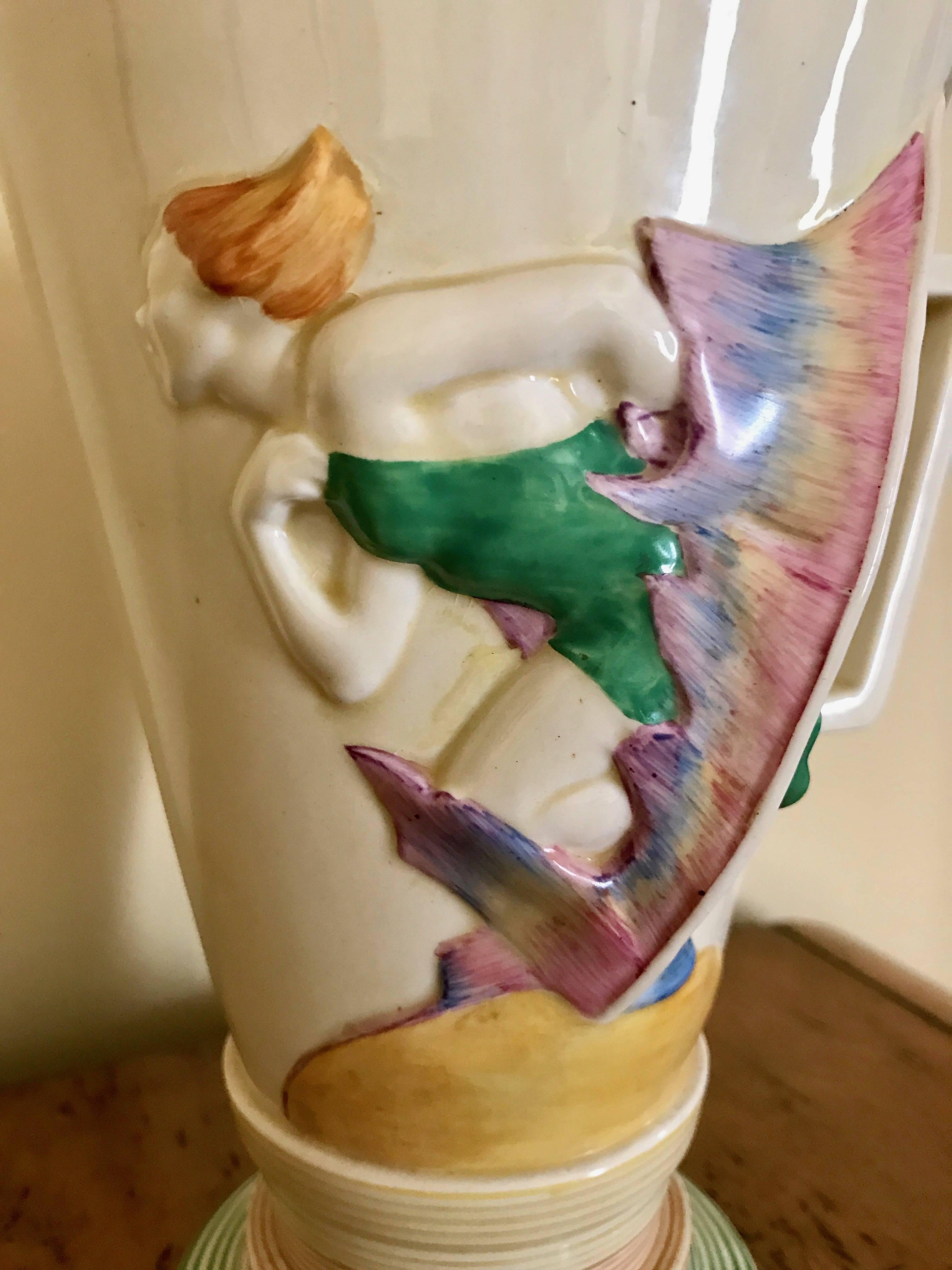 An Art Deco masterpiece from Clarice Cliff, famous for her line of Bizarre ware ceramics that introduced modernist, cubist, playful and bold themes into the conservative world of British ceramics and tableware. This dates from the period of 1930