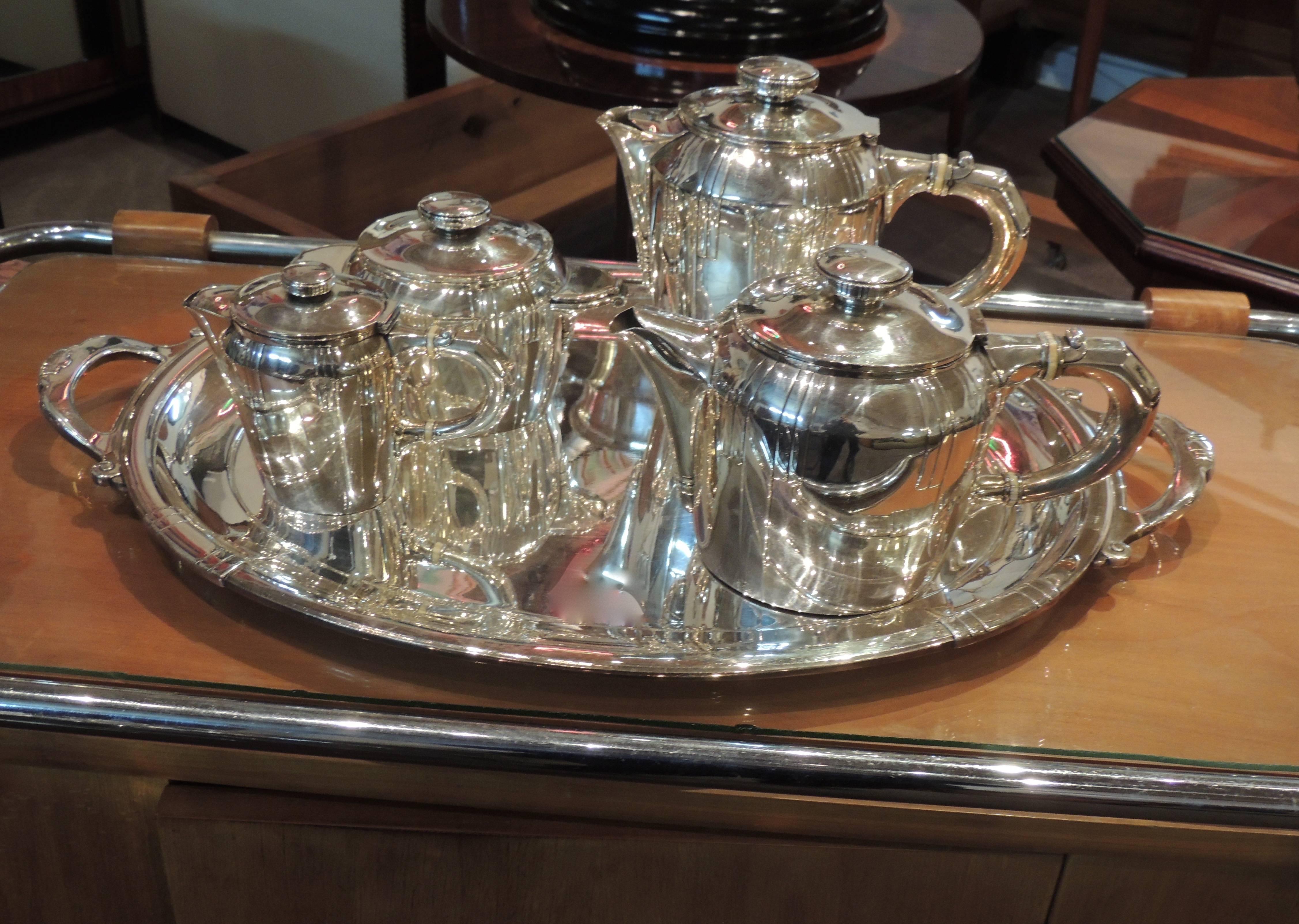 Complete French Art Deco silver plate tea and coffee Set from the “Golden Age” of Buenos Aires when the city was one of the richest in the world and brimming with the artistic influence of Europe. There was a fashion for English High Tea, offered