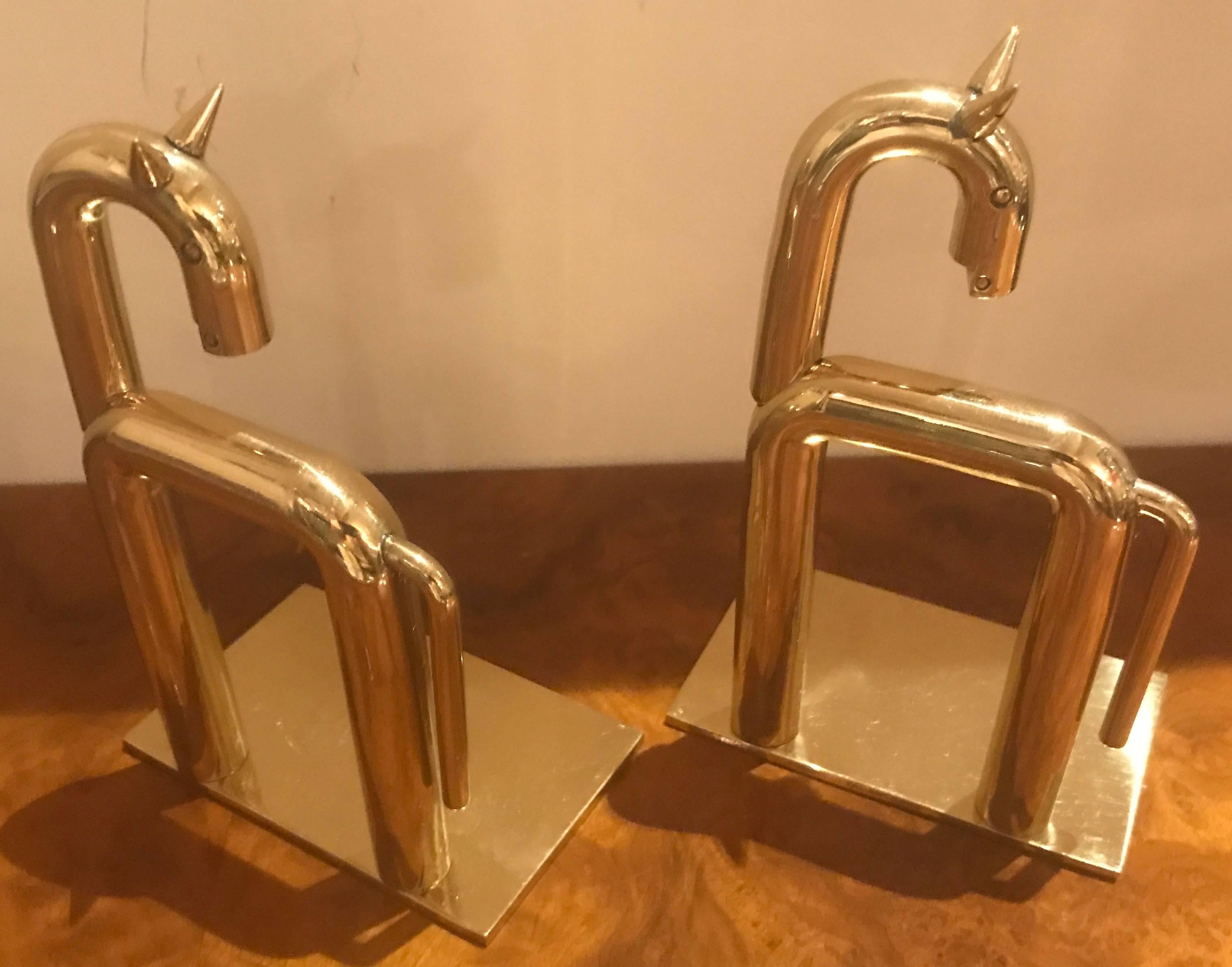 Pair of Chase Equestrian bookends sculpture designed by Walter Von Nessen in 1932. Industrial Design incorporated with the latest materials and machine age approach. These are in mint condition with newly polished brass finish. Von Nessen was the