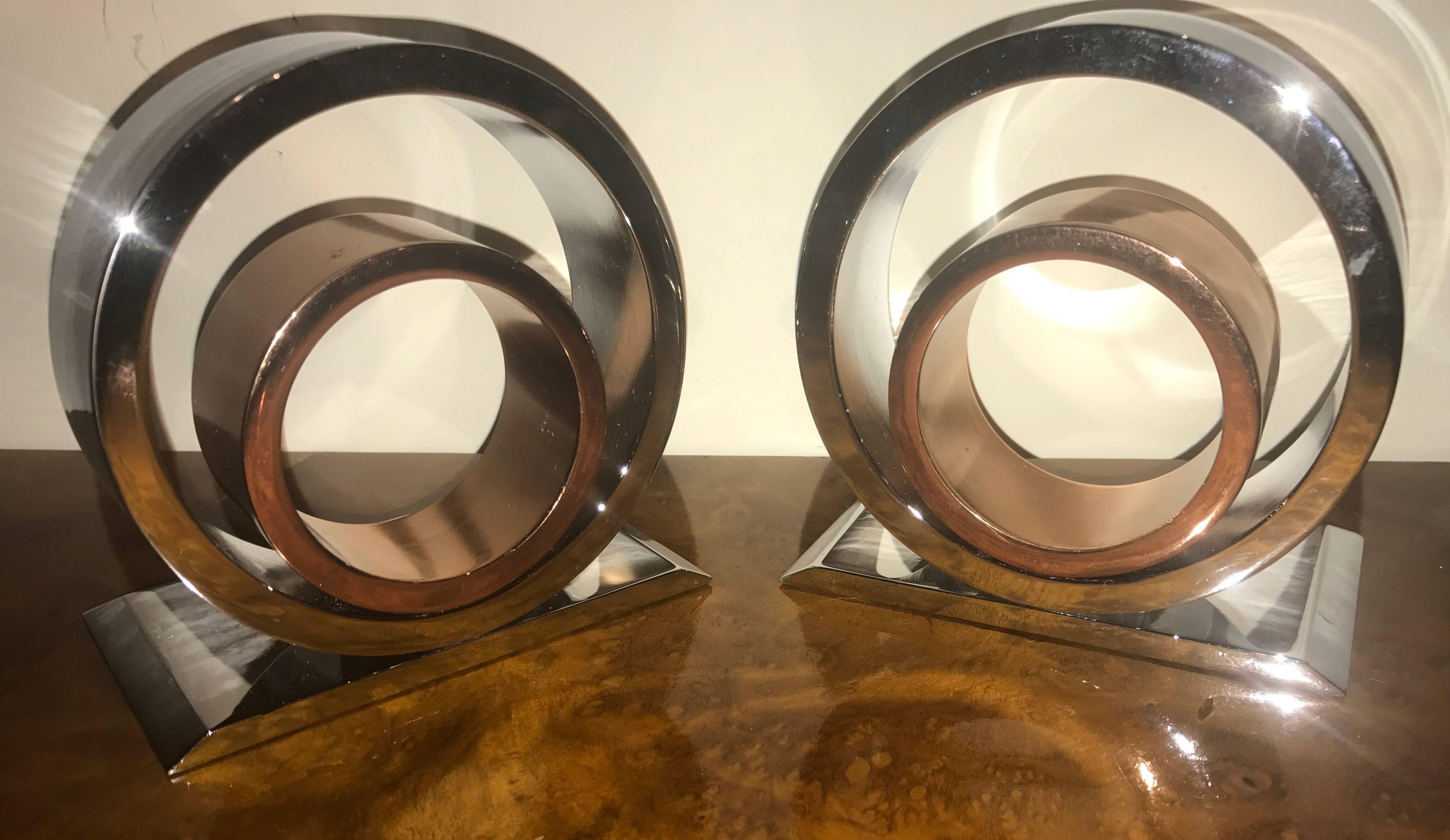 Vintage High quality modernist bookends in the style of Chase by Walter Von Nessen. Shiny polished chrome and copper very thick and heavy construction. Metal sculpture, period Art Deco Industrial design.