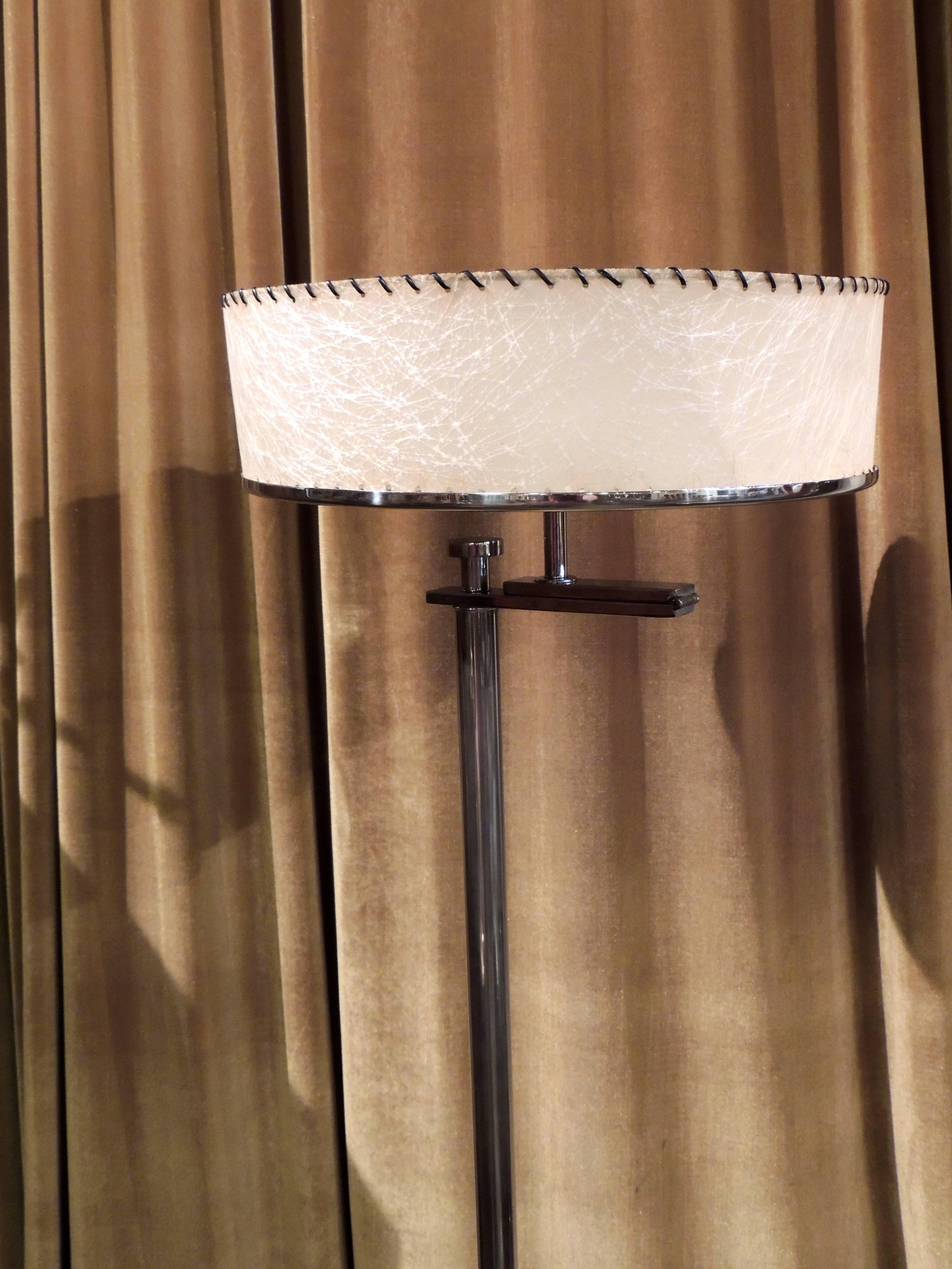 This flip-top convertible floor lamp by Kurt Versen was created in the “Deco Era” but it certainly has all the elements of a midcentury point of view and would be equally “at home” in either environment.

The chrome-plated brass Stand has a hinged