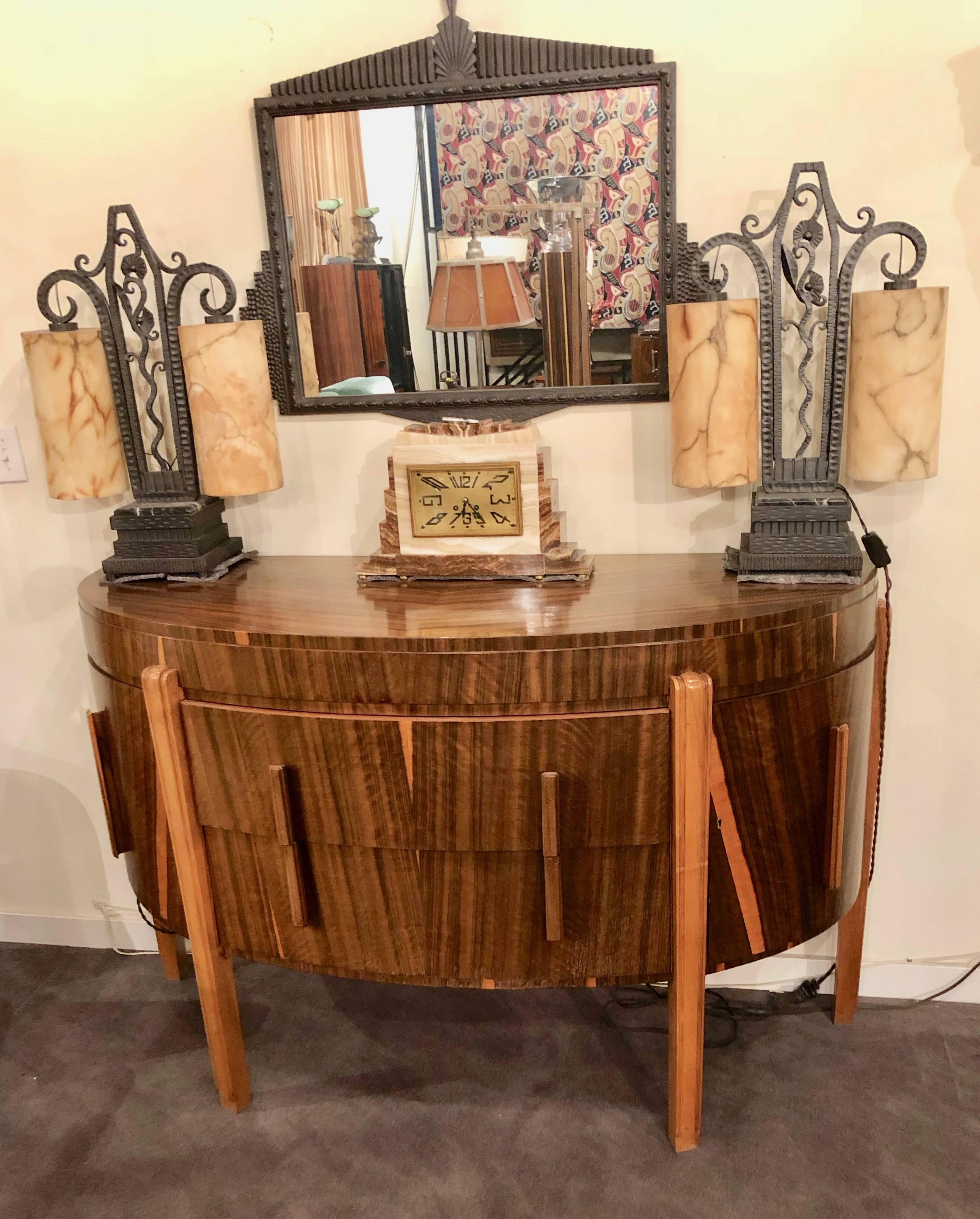 Unique demilune Art Deco buffet storage cabinet. I believe of English original in a super intensely grained first growth Macassar wood. Was originally used as part of dining room set, but could be adapted for any space where you might be looking for