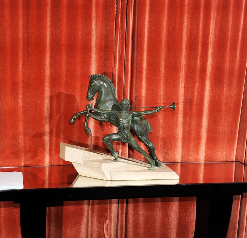 This truly magnificent showpiece will quickly dramatize your mantel, console, bookcase or...? The sculpture depicts an Olympian male trumpet blower next to his leaping horse, holding him in place by the reins' It's a very well made French statue,