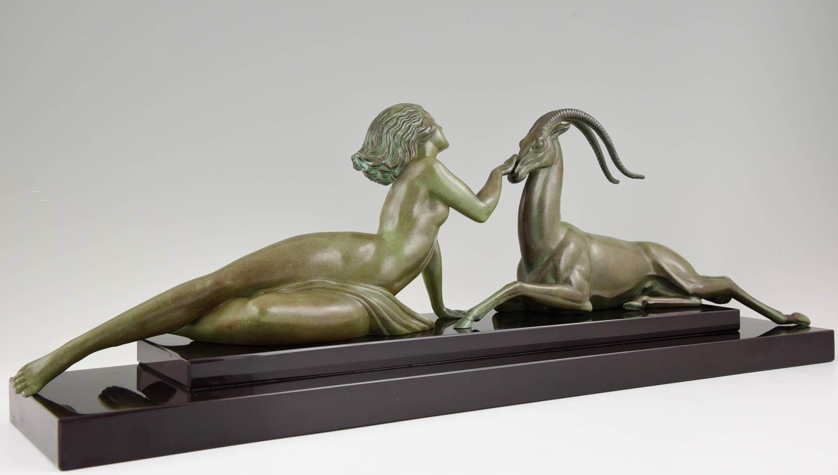 Stunning genuine Max Leverrier edition of Pierre Le Faguays famous sculpture “Seduction”. Original  patina in excellent condition.  Fayral signature (Pseudonym of Pierre Le Faguays). Circa 1930′s. The emblematic Art Deco image of the woman and the