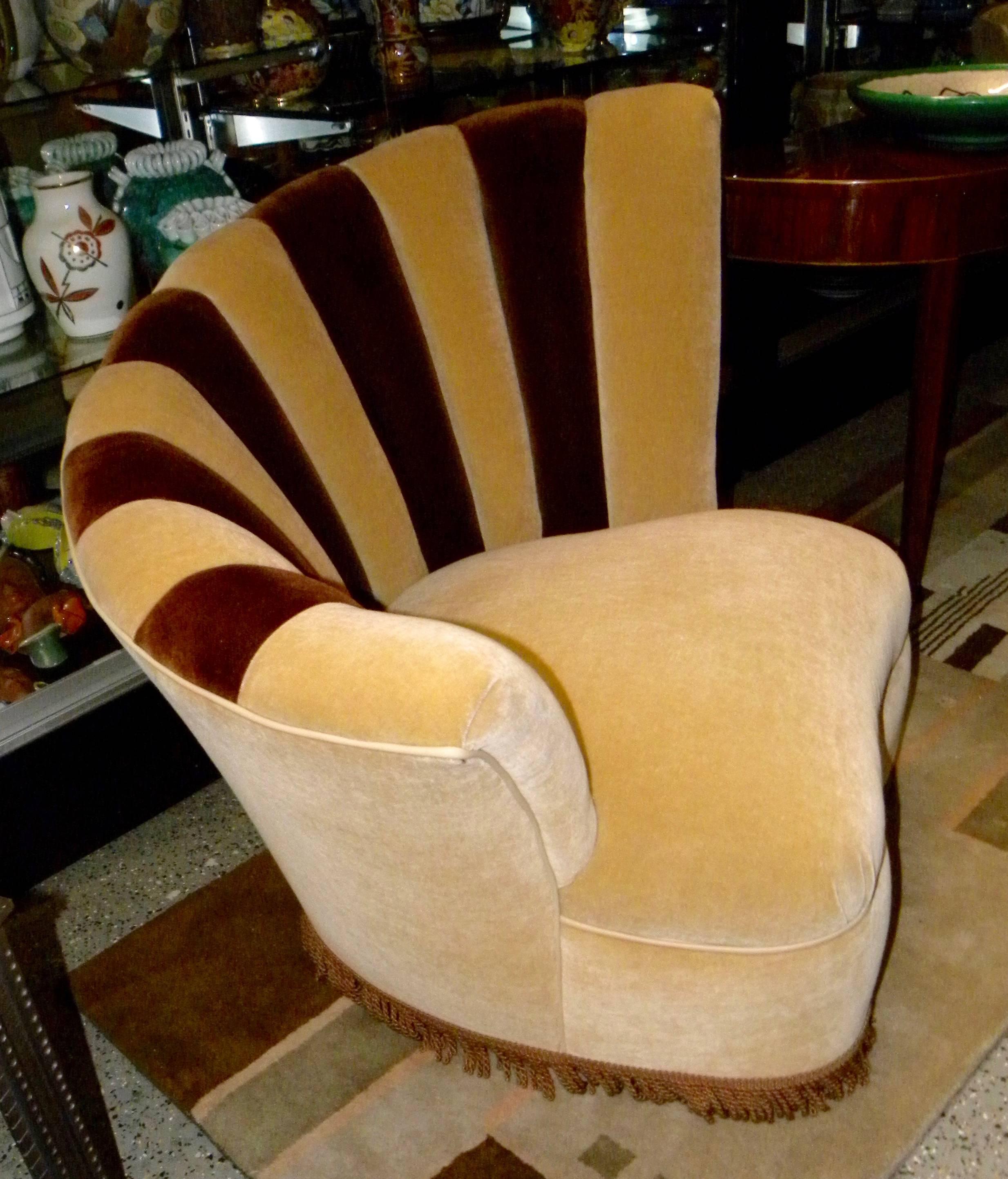 Fanned back Hollywood style glamour chairs. Wonderful two-tone mohair stylish chairs. Just finished these beauties in a cream base color with a dark brown contrasting detail (all piping in matching leather). They have swivels behind the fringe