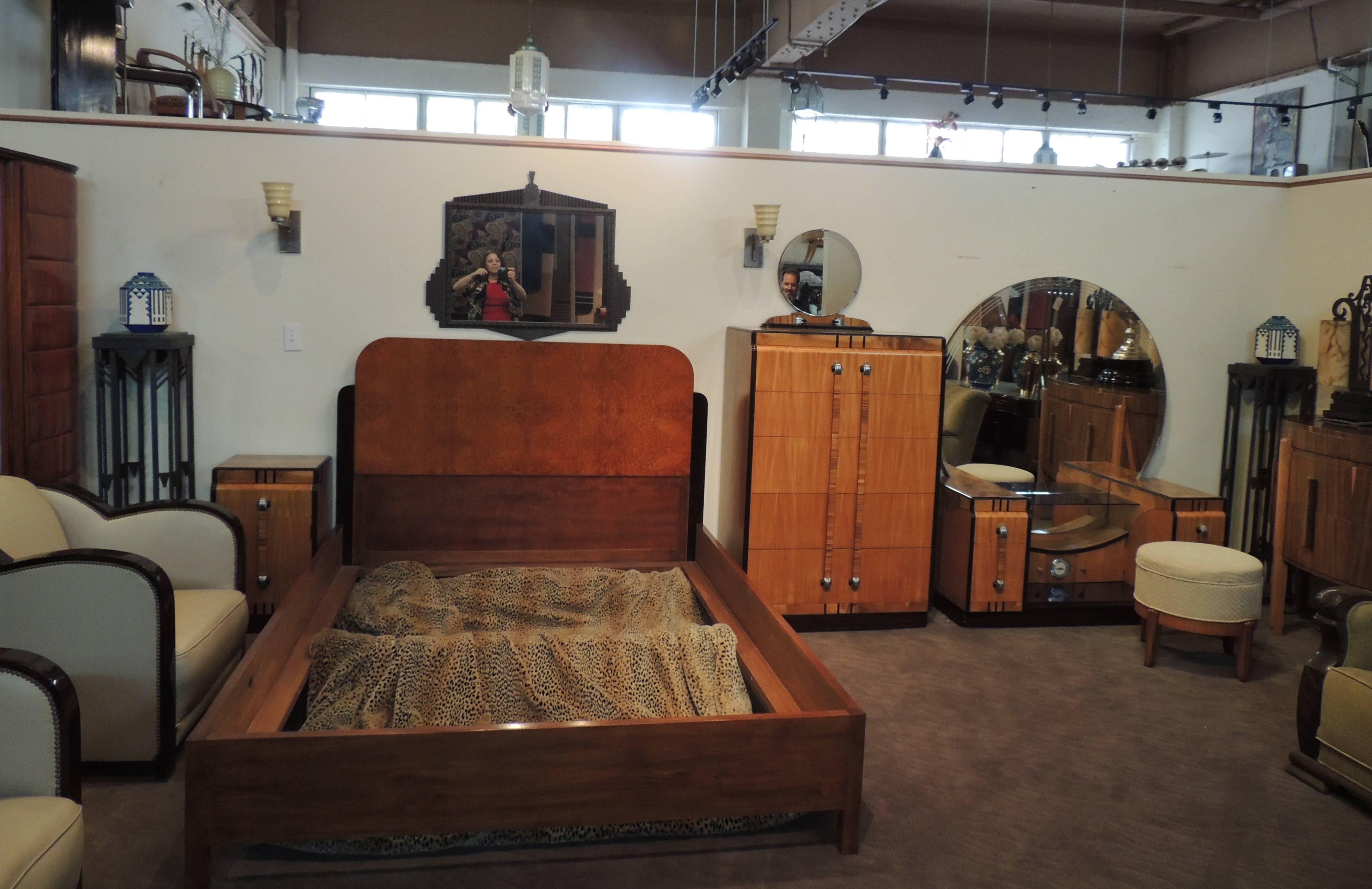 American Art Deco modernist streamline bedroom suite by Leo Jiranek has been recently restored and refreshed. This stunning five piece suite, with multiple wood veneers, outrageous metal hardware and wonderful mirrors consists of a tall dresser
